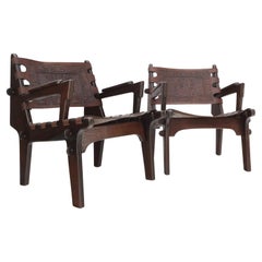 Used Pair of Walnut Carved Tolled Leather Sling Seats Arm Chairs by Angel Pazmino