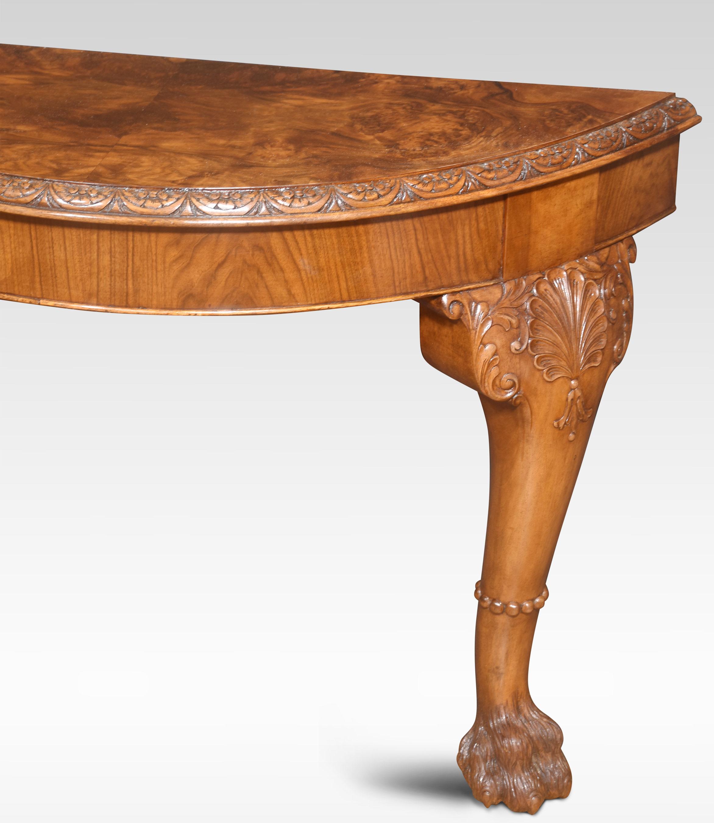 Pair of Console tables, the well-figured walnut tops having cared moulded edge, to the frieze raised up on two bold cabriole supports terminating in hairy paw feet. The tables can be secured by fixing directly into the wall.
Dimensions
Height 29
