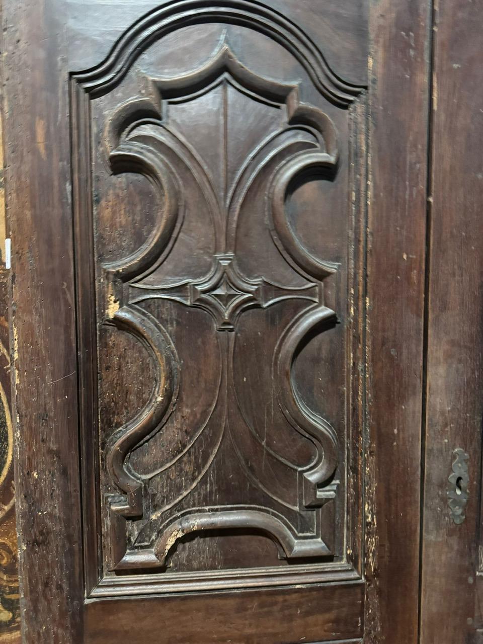 Hand-Carved Pair of walnut doors with carved Baroque panels, Italy For Sale