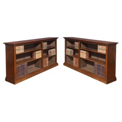 Pair of walnut dwarf open bookcases