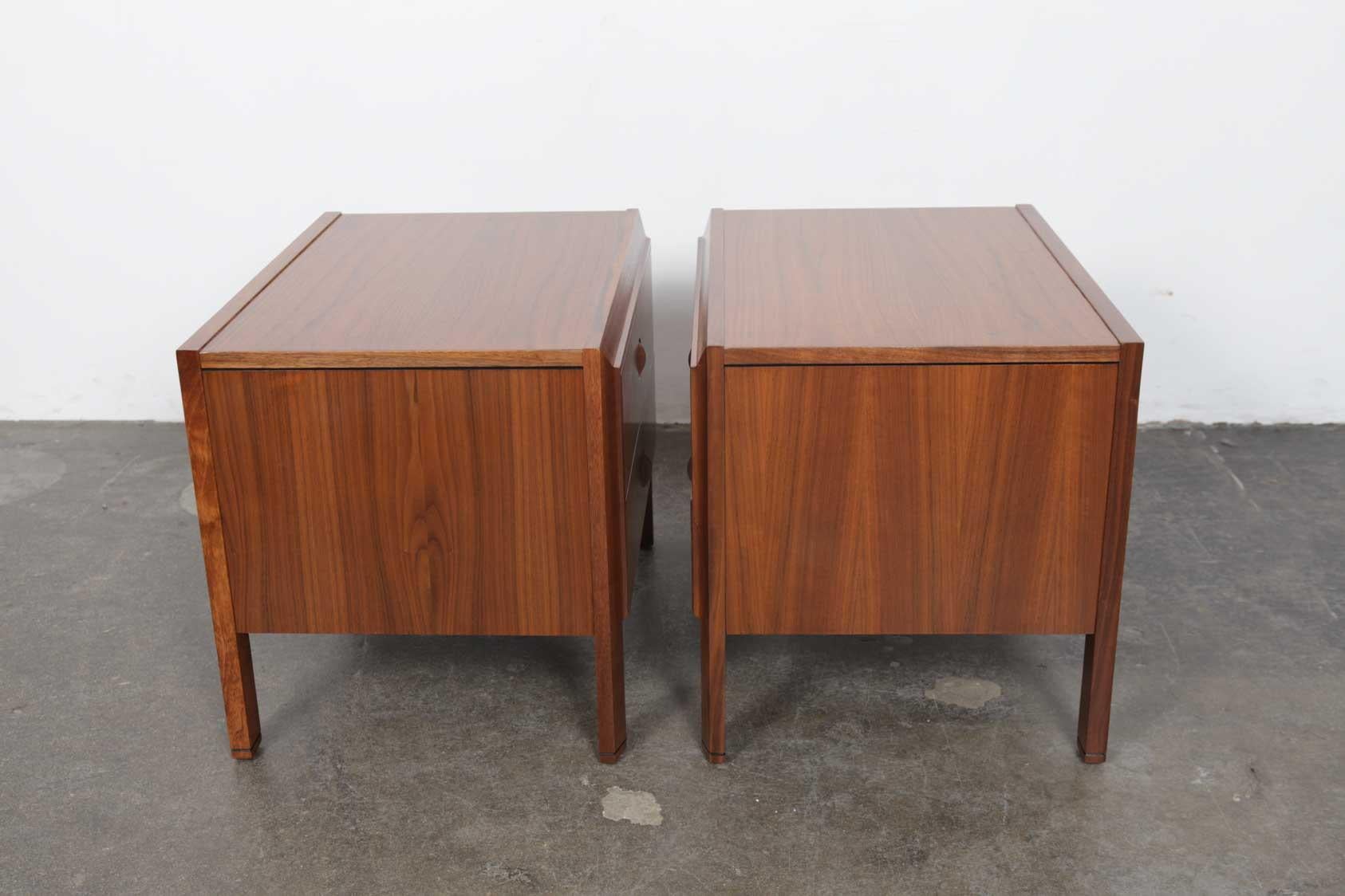 Pair of two-drawer walnut end tables by Milo Baughman for renowned American manufacturer Glenn of California, recently been refinished in a satin lacquer finish.