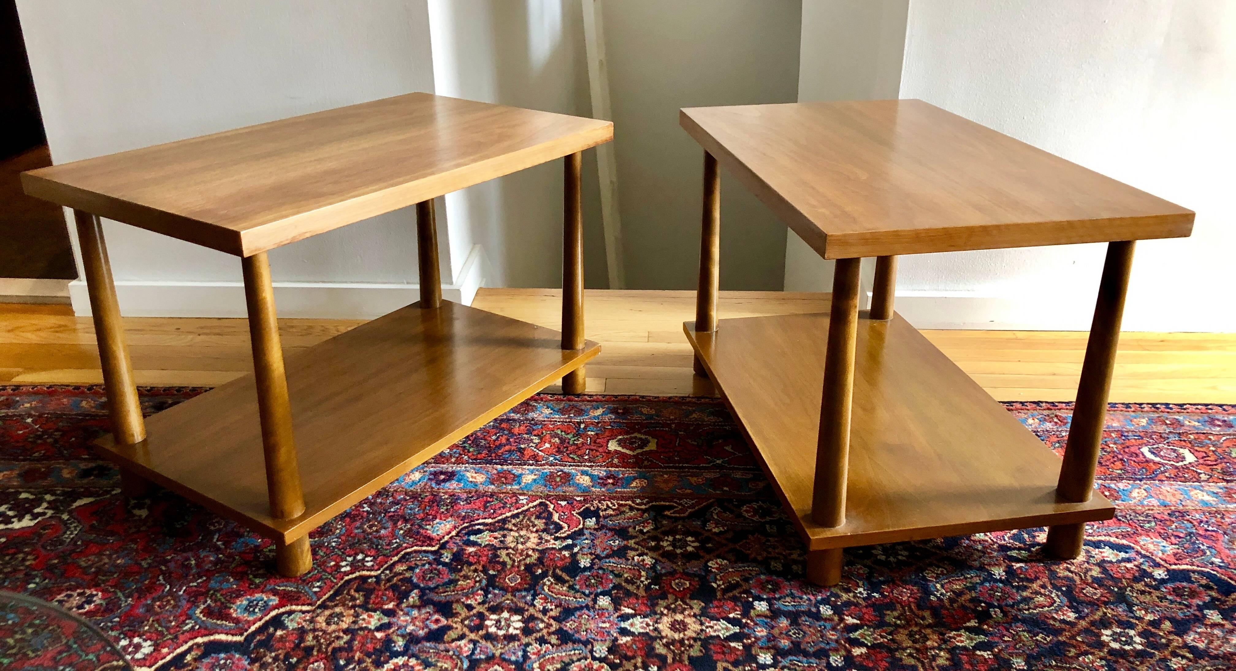 Classic Gibbings two-tier tables with inverse tapered dowel legs. Perfect proportions with through-dowel detail are an early expression of Gibbing's simplified modern elegance. With Widdicomb labels to underside.