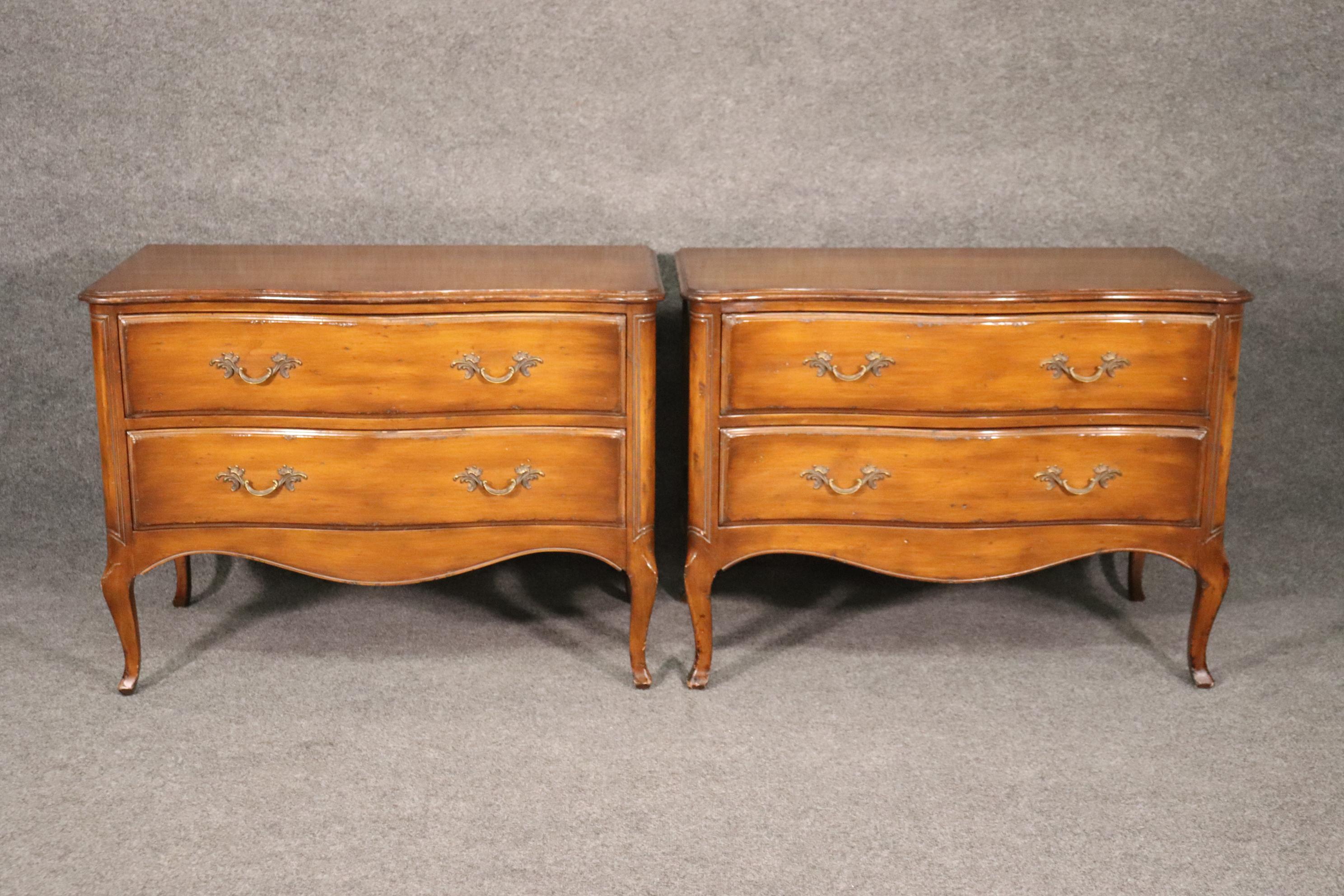 This is very good pair of French Louis XV commodes from the 1950s. The 38 wide x 20 deep x 29 tall.