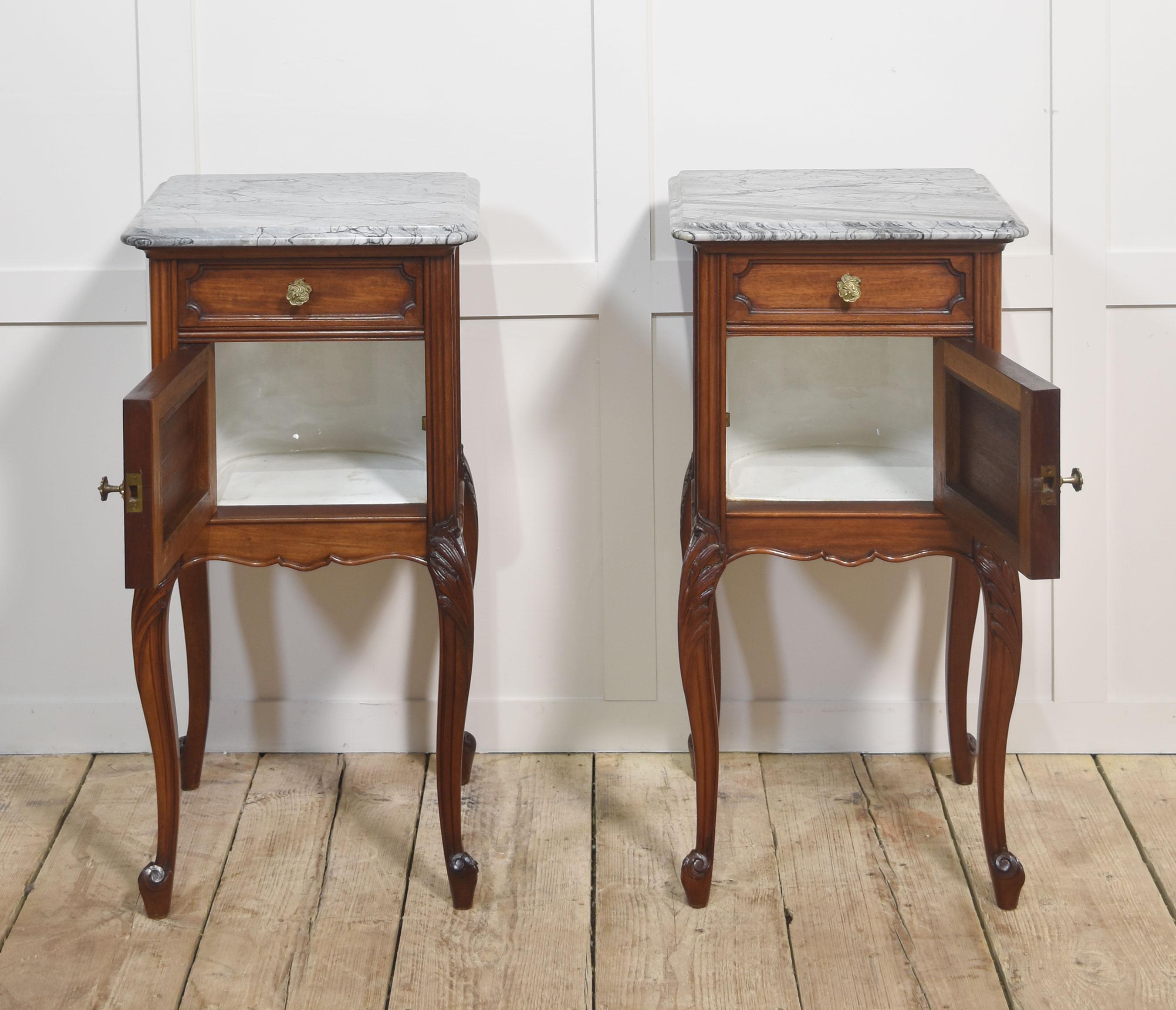 20th Century Pair of walnut marble top bedside cabinets For Sale