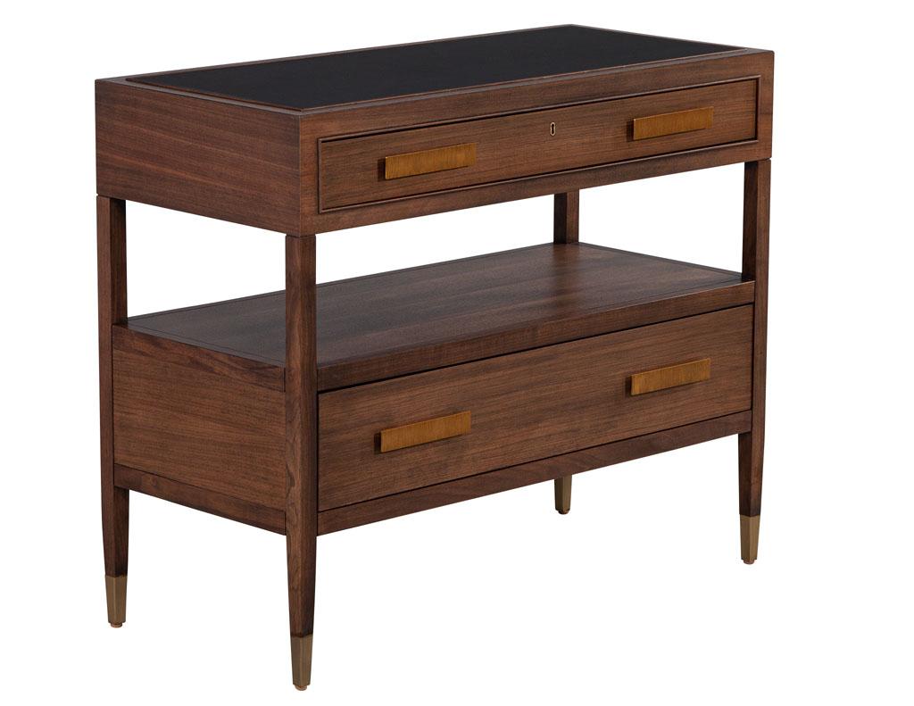 Pair of walnut nightstand chests with black lacquered tops. Brand new and made in USA, composed of walnut. 2 Tier design with ample open storage. Chests have 2 drawers both lined with black velvet and a satin black lacquered top. Completed with