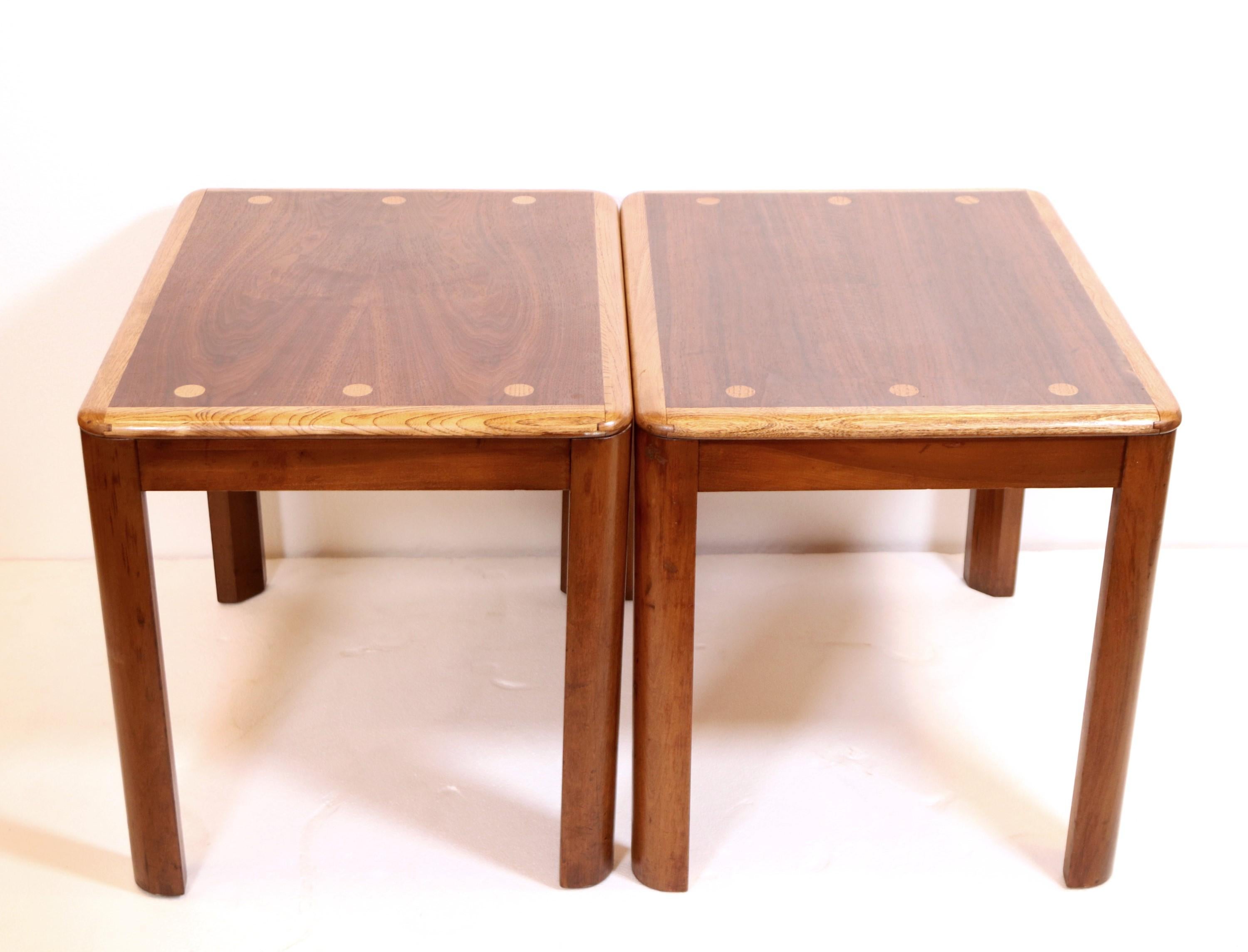 Pair of walnut and oak side tables made by Lane Furniture.  Each table is decorated with three dots on each side.  The Lane style number is 1595 05. Serial number 2672010. Priced for the pair. Please note, this item is located in one of our NYC