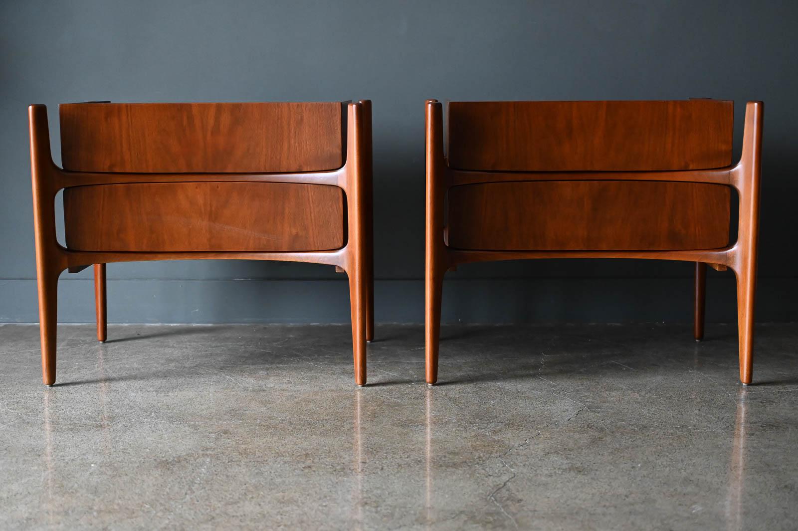 Pair of Walnut Sculpted Nightstands or End Tables by William Hinn, circa 1955. Beautiful sculpted exoskeleton with curved drawers. Professionally restored in showroom condition, pairs like these rarely come to market. Solid walnut legs with walnut