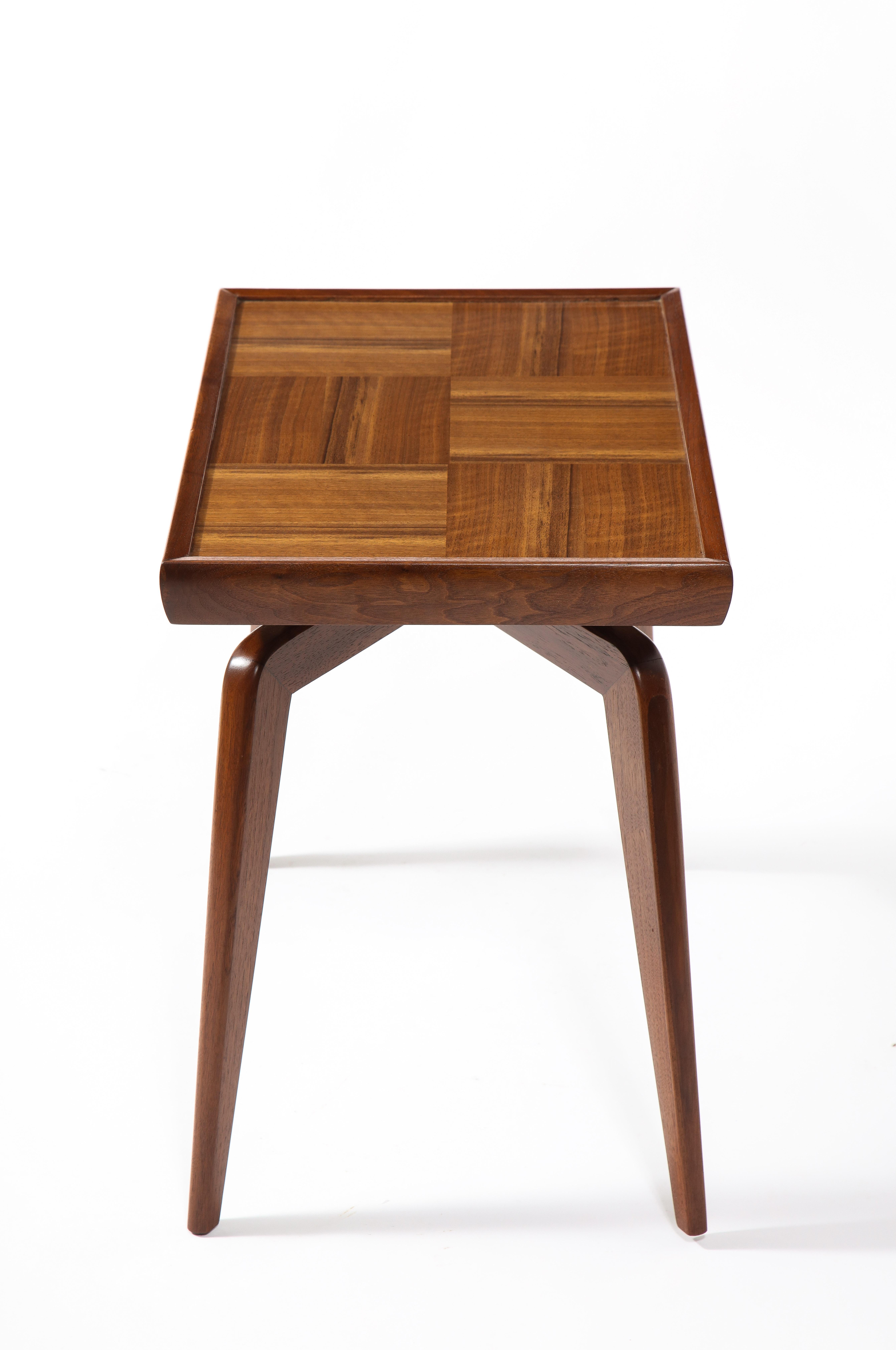 A pair of walnut tables by Superior furnishings, on four legs with a recess under the top tray.