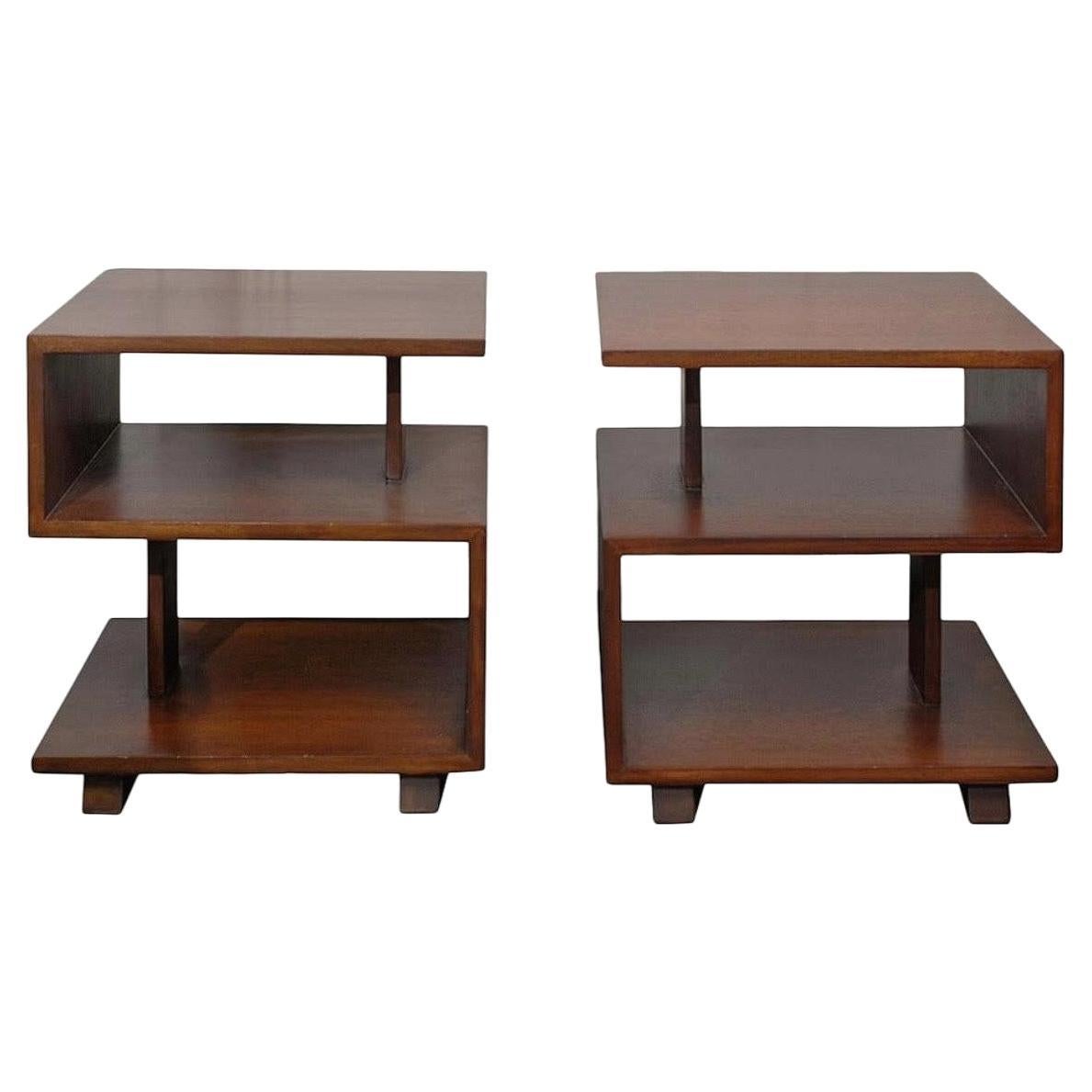 Pair of walnut three tier end tables. USA, circa 1950's