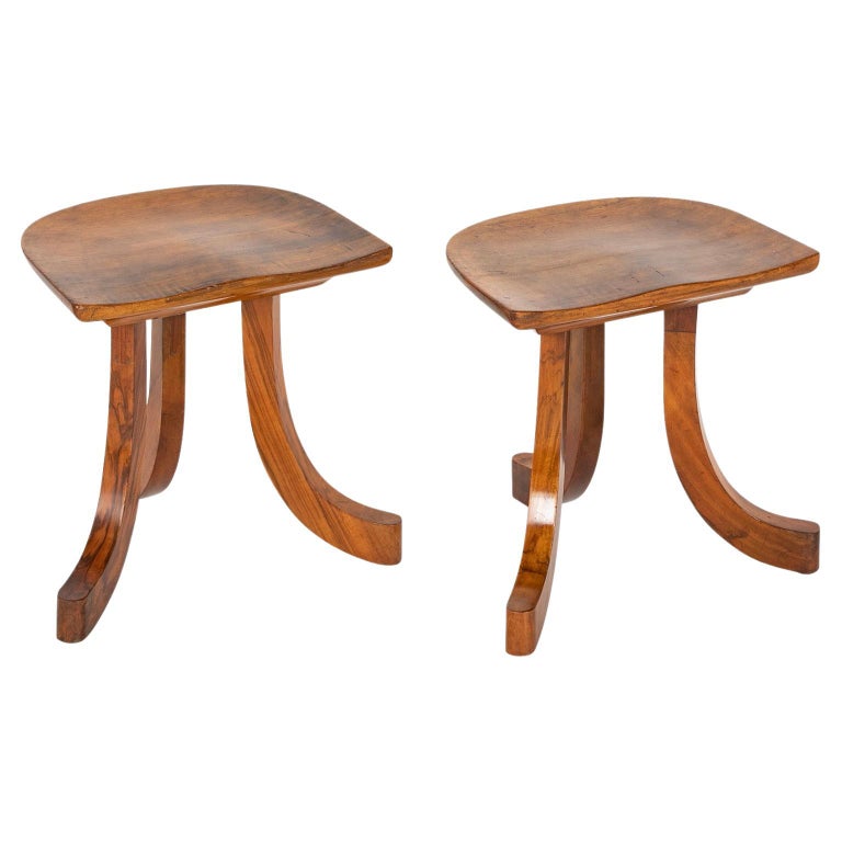 Pair of Walnut Tripod Thebes Stools in the Manner of Liberty & Co. Pair of Walnut Tripod Thebes Stools in the Manner of Liberty & Co.