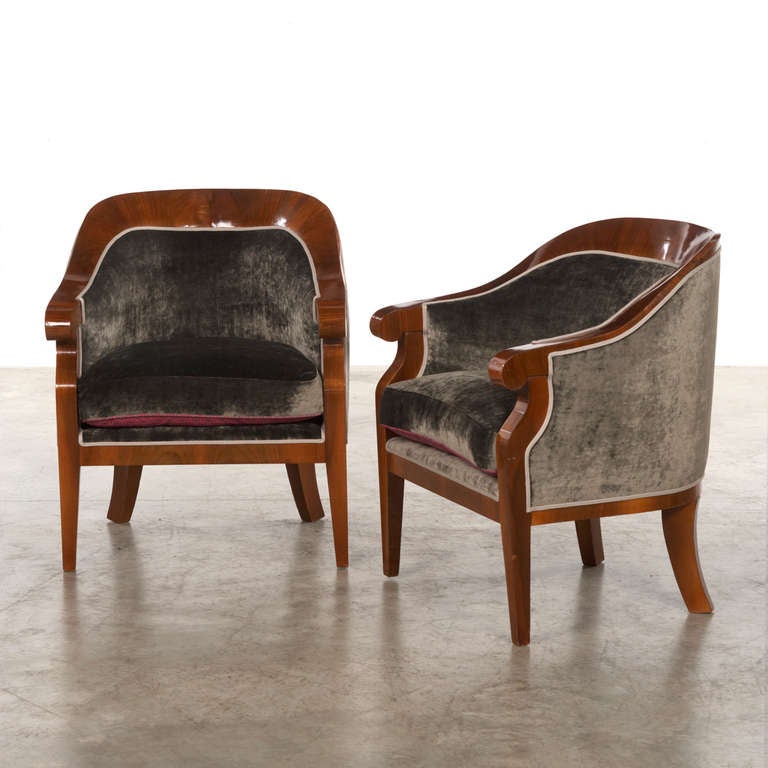 Pair of Art Deco armchairs, walnut veneered. Elegant and decorative. Reupholstered with grey velvet from zinc. Sold as a pair.