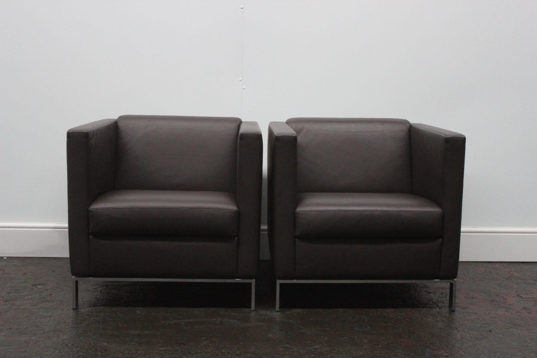 On offer on this occasion is a rare suite of “Foster 500” seating, consisting of an identical pair of “500.10” Armchairs from the world renown German furniture house of Walter Knoll, dressed in a sublime matt Dark-Brown leather, and with Matt