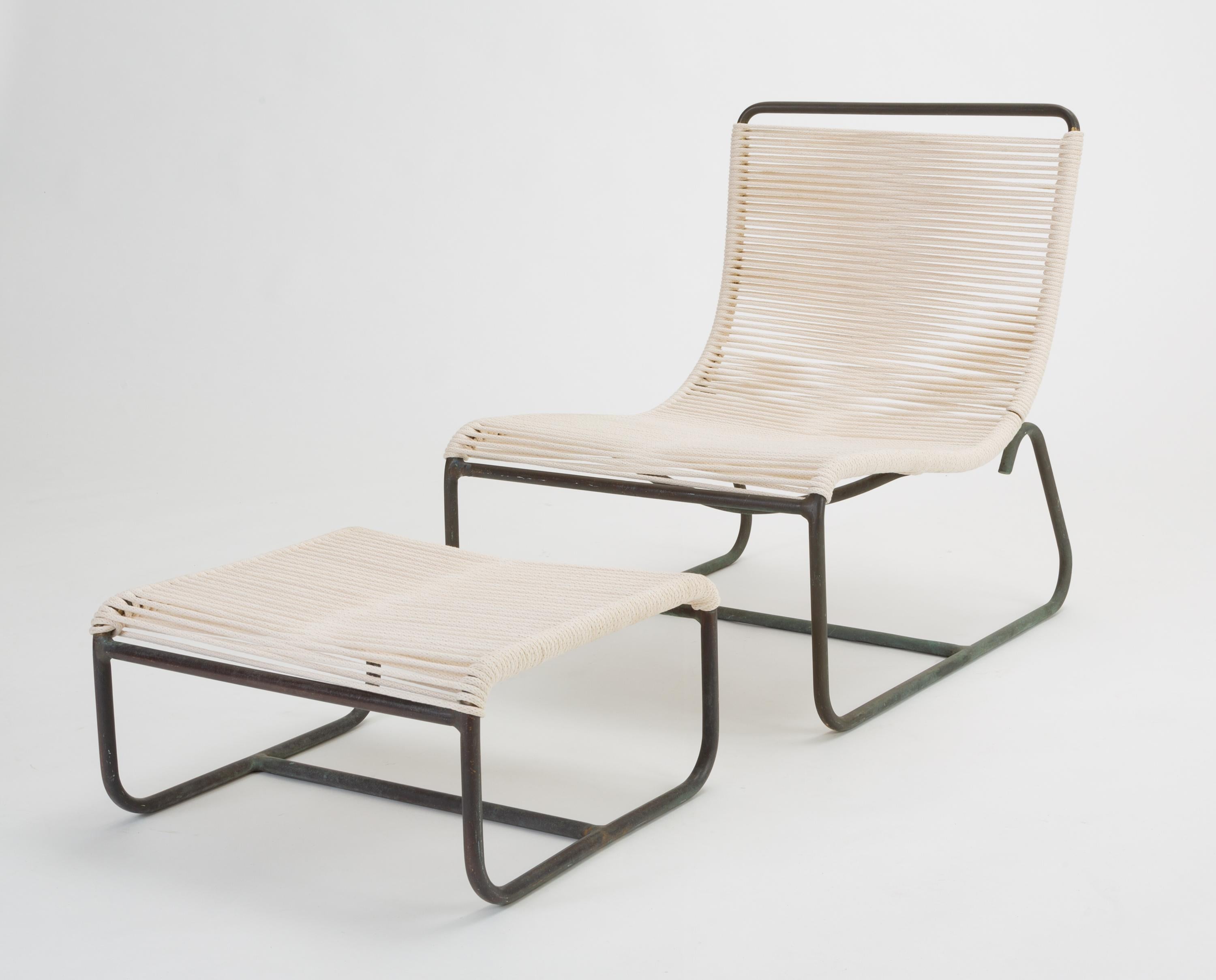 A pair of low lounge chairs, known as the “Sleigh Chair” by Walter Lamb for Brown Jordan. The pair comes with a single ottoman that slides beneath the chair seat for easy storage. A continuous length of tubular bronze serves as the frame of a