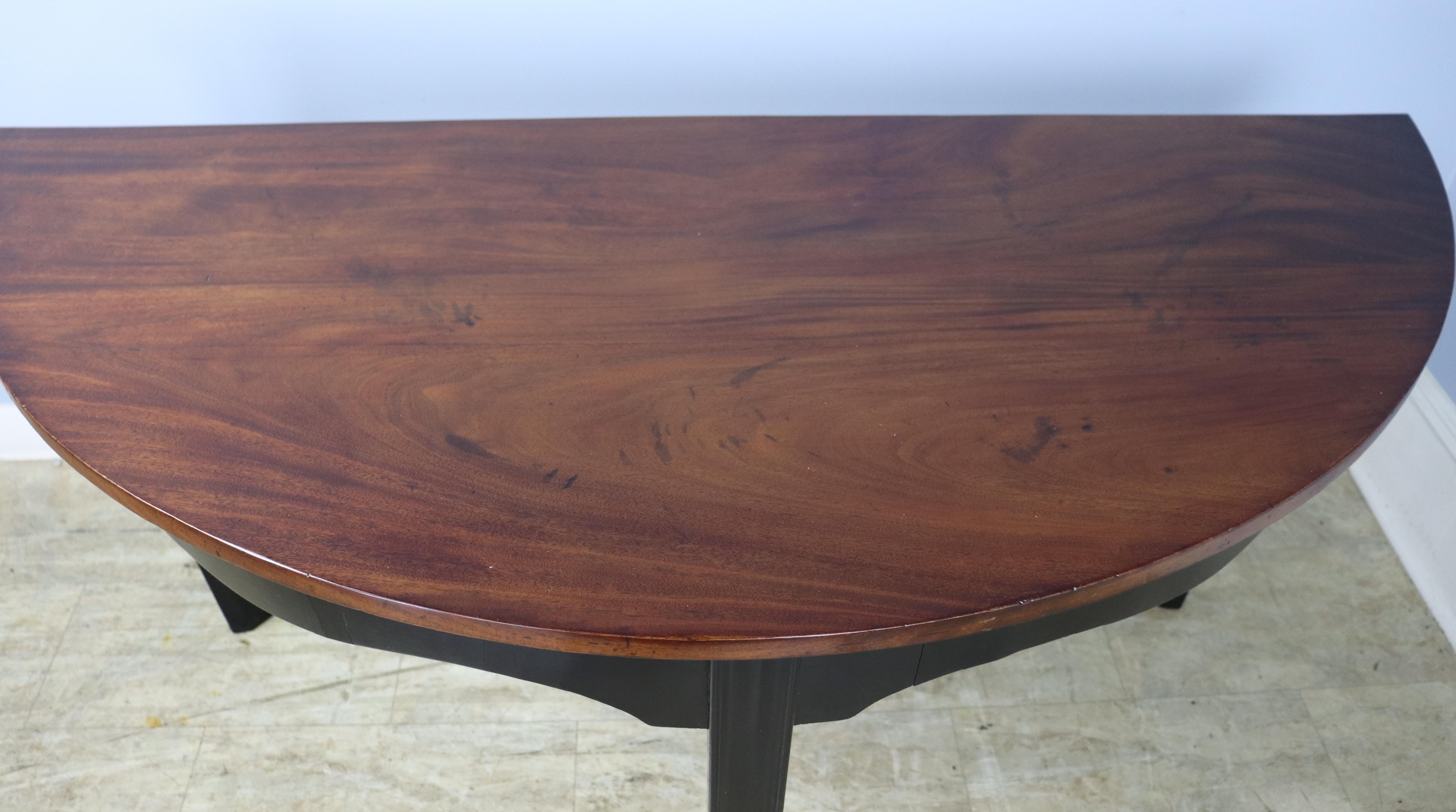 Pair of Walnut Demi-Lune Console Tables, Ebonized Bases In Good Condition In Port Chester, NY