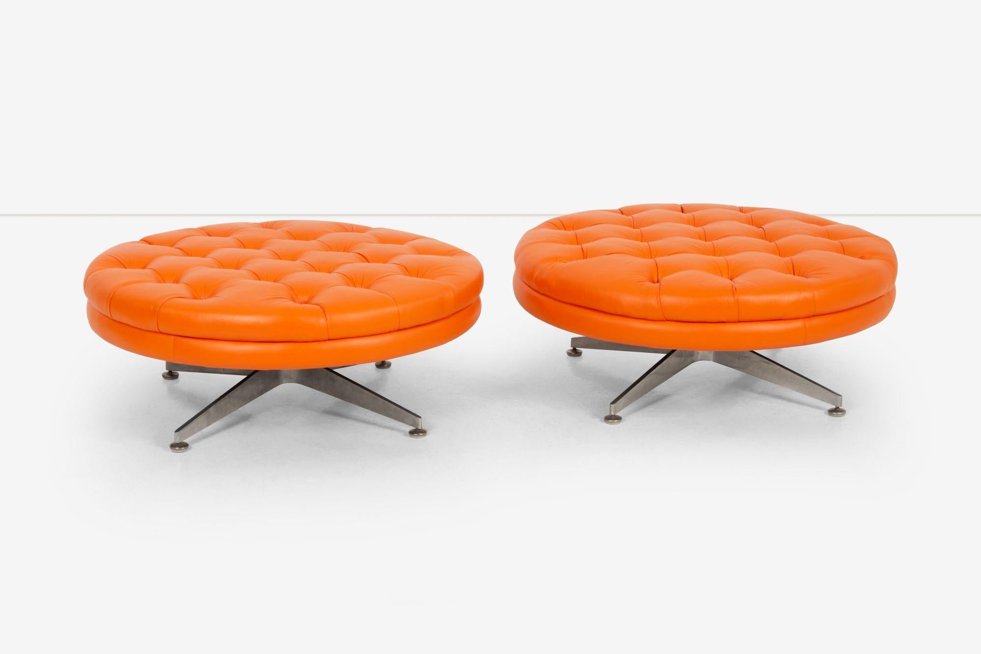 Pair of Ward Bennett Ottomans from Palm Springs, California
Restored in orange Spinneybeck leather, button tufted design.

Ward Bennett, an influential American furniture designer known for his minimalist and sophisticated approach to design,