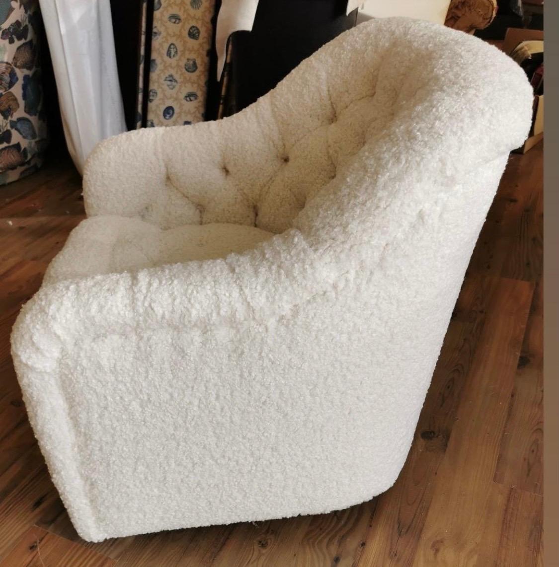 Pair of iconic lounge chairs for Brickel Associates. Tufted lounge or club chairs newly reupholstered in a luxurious faux shearling fabric. Great lines and better scale. Features curved armrests
that promote comfort as well as coiled spring