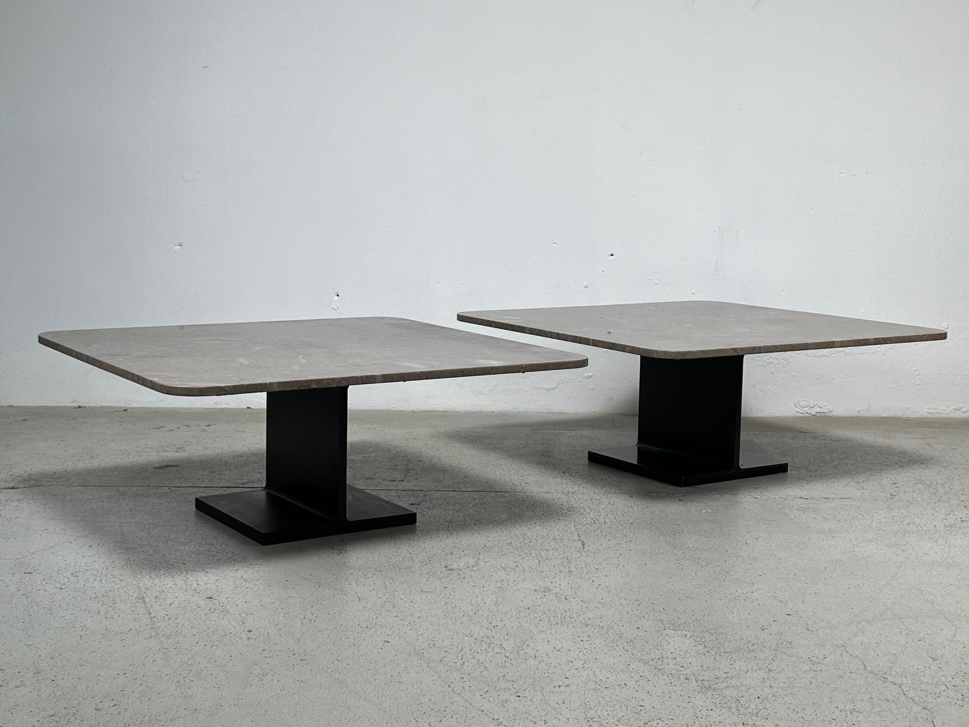 A pair of matching Ward Bennett I-beam coffee tables with marble tops. 