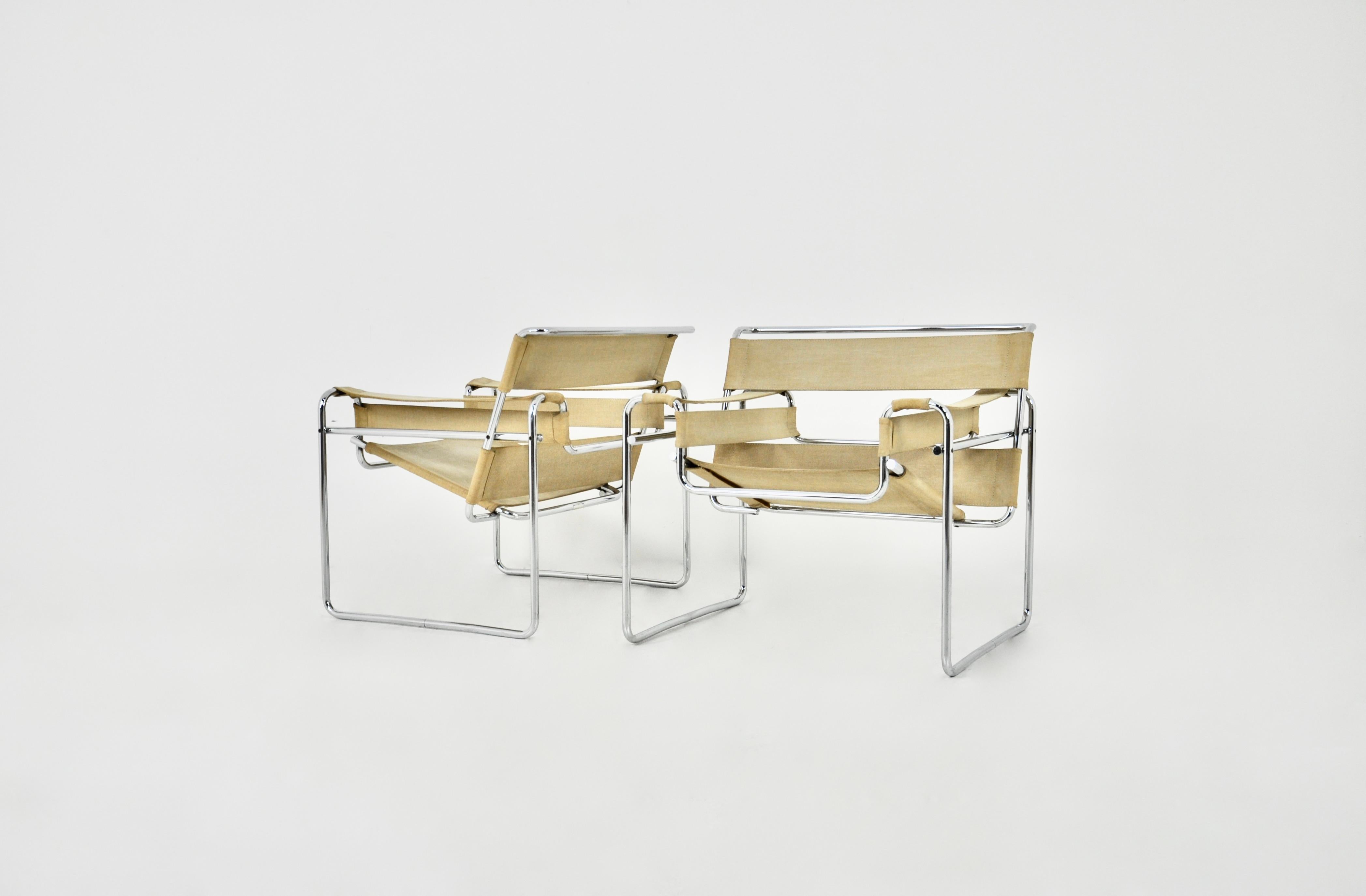Pair of Armchairs in Chromed metal and beige canvas (fabric). Stamped Gavina. Seat height: 43 cm. wear due to time and age of the chair.