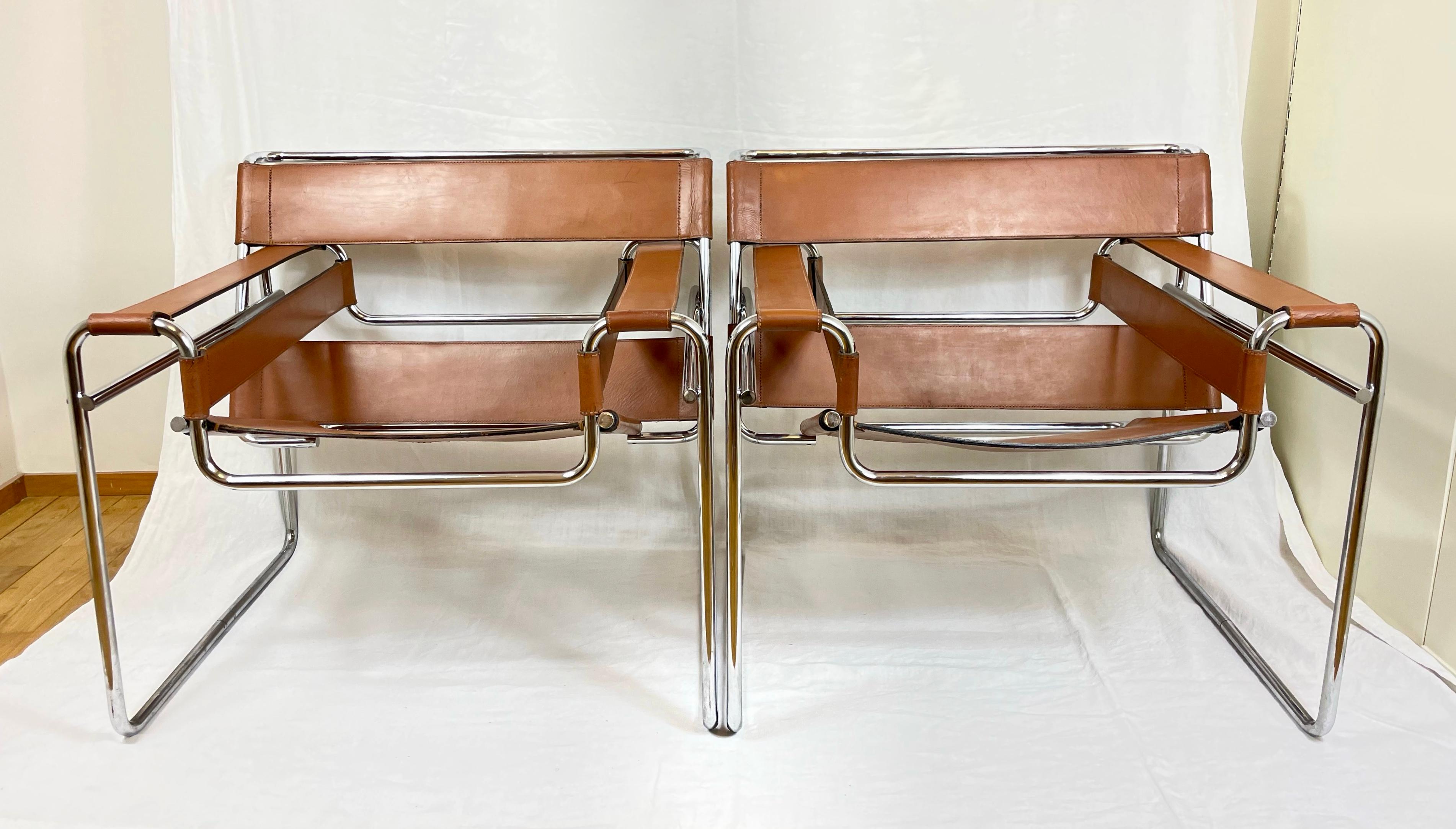 A beautiful pair of Wassily lounge chairs by Marcel Breuer (1902 - 1981).
The iconic Marcel Breuer chair originates back to 1925, this pair were manufactured in the early 1960s.
Made from chrome and saddle leather with the rich tan colour of the