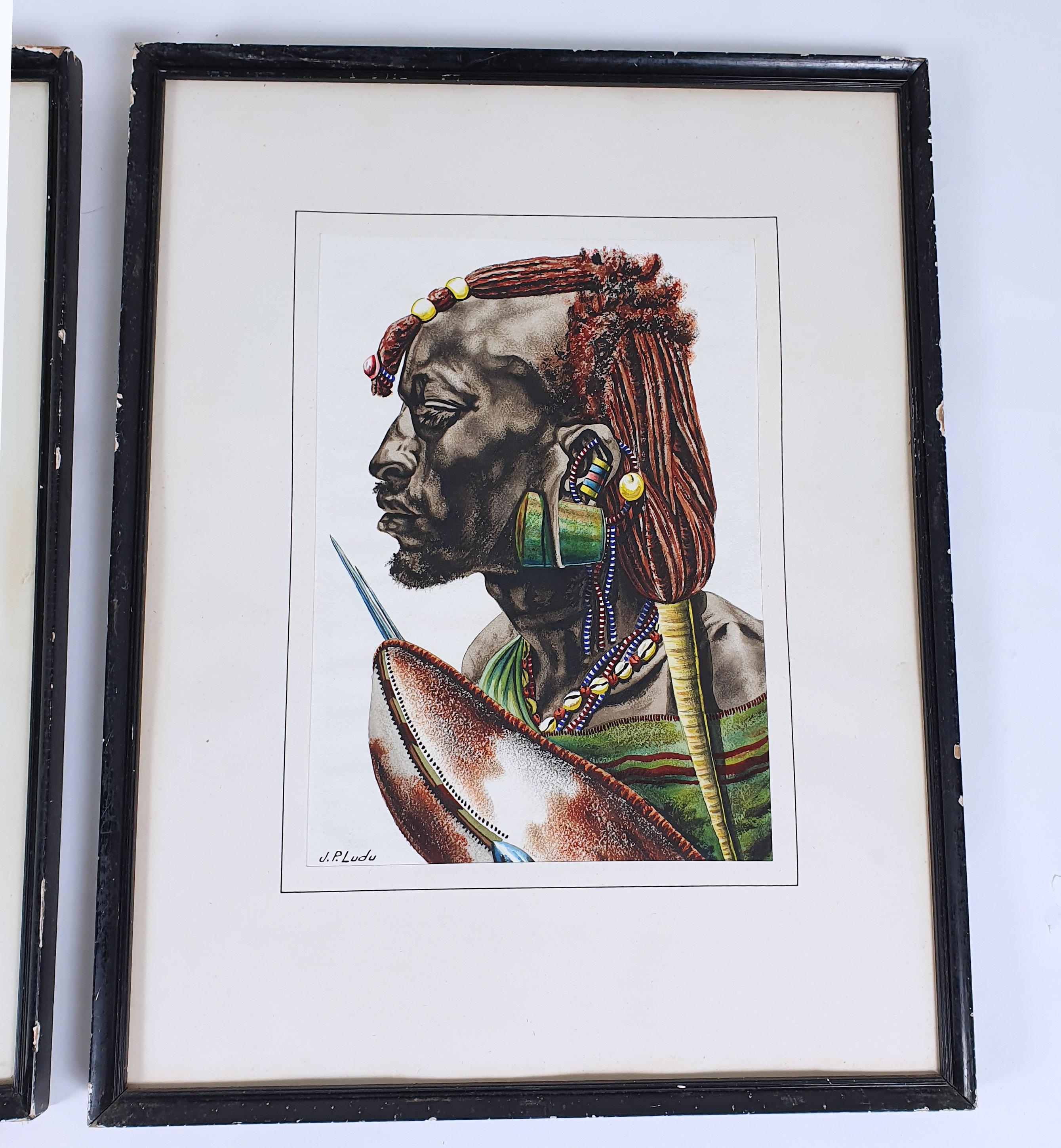 This magnificent pair of watercolours depicts 2 African tribesmen and are entitled Masai May 1963 and Karomojong May 1968. The watercolors are signed J P Ludo, a local artist from Ugandan, and are both in the original frames. Each picture with the