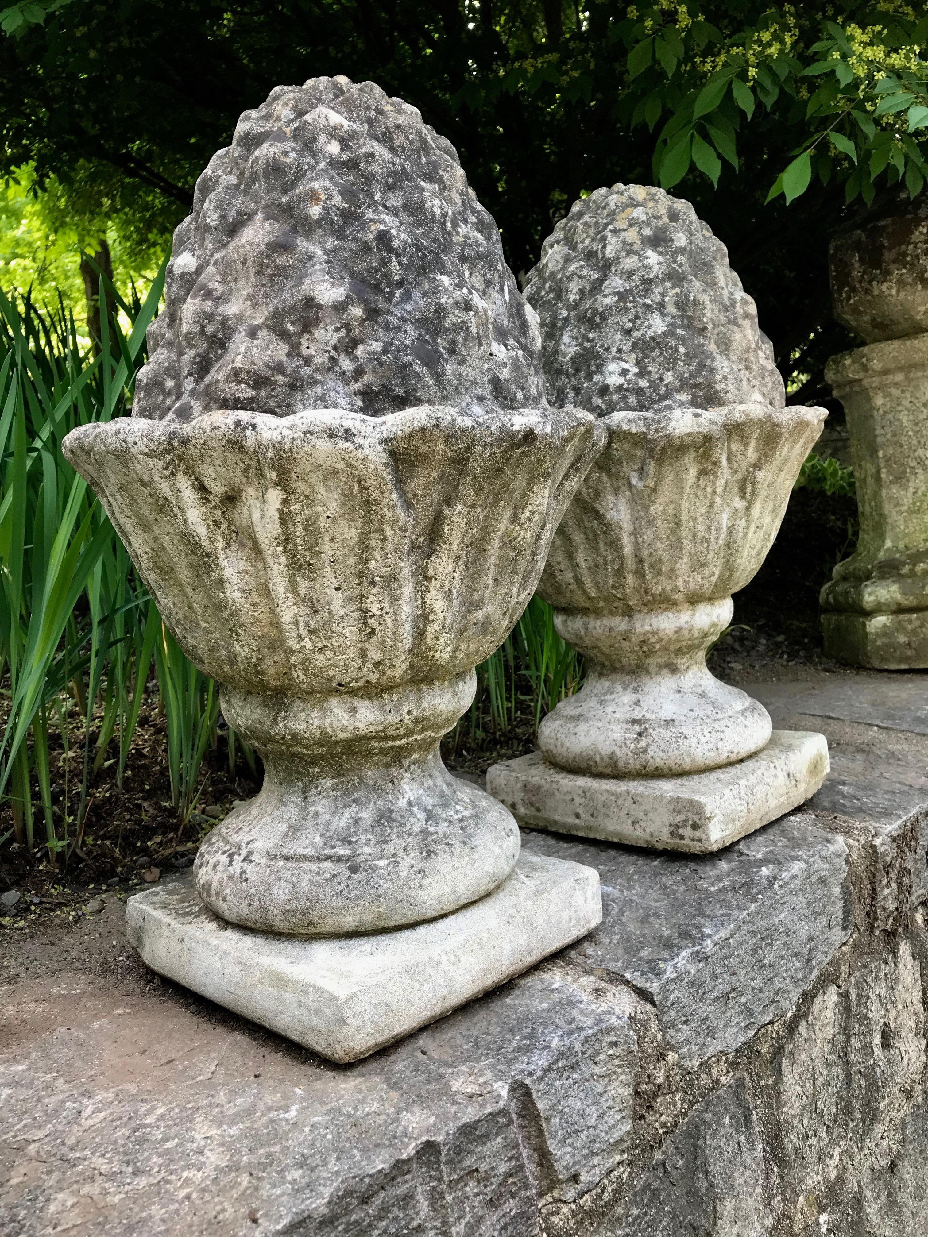 We’re always in search of pineapple or acorn finials and this pair is truly lovely. With a beautiful grey patina overall that is darker on the top, they would make an impressive statement atop a stone wall flanking the entrance to your garden, on a