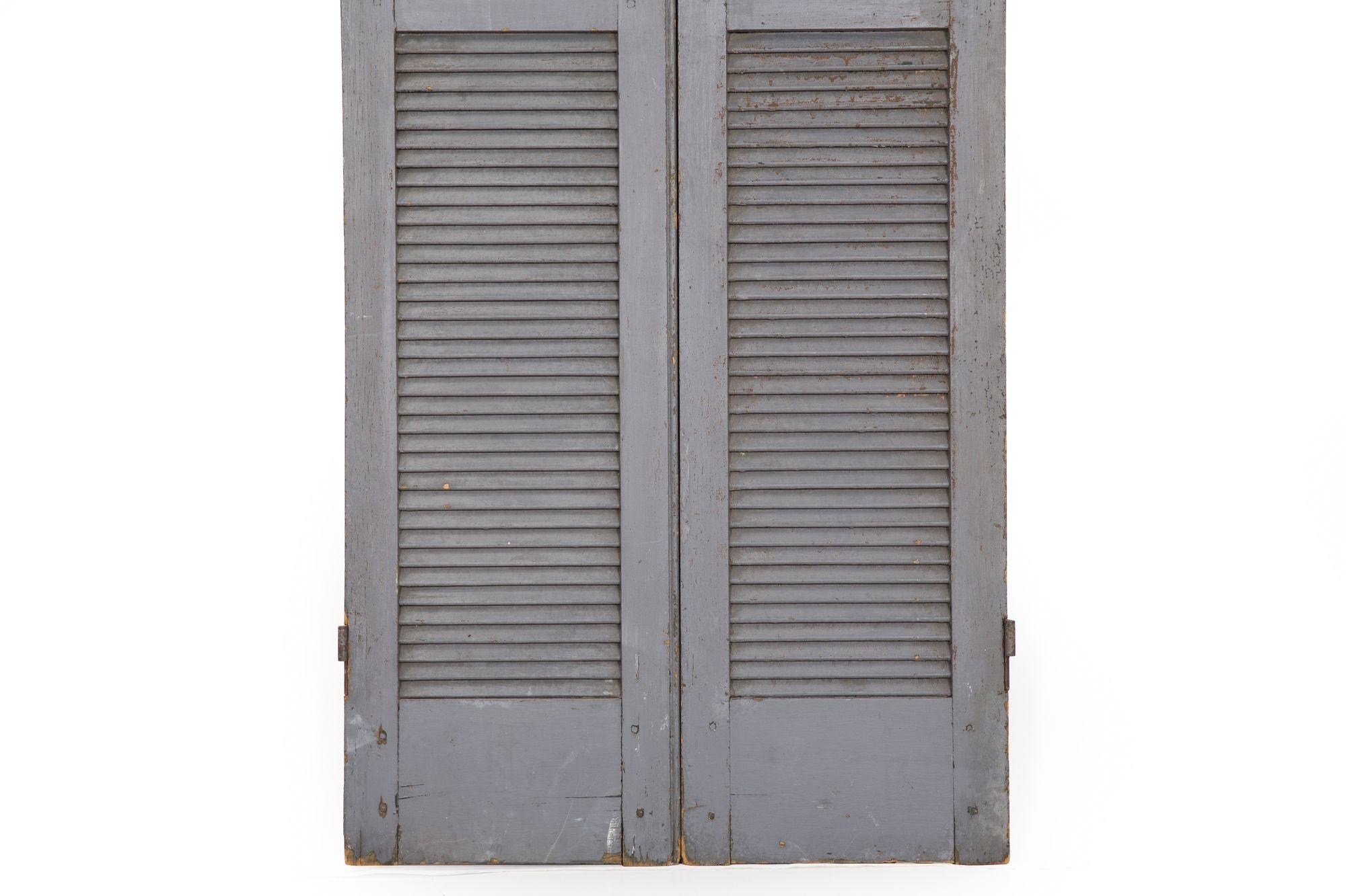 arched louvered door
