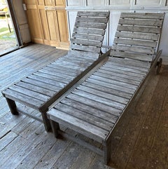 Pair of Weathered Vintage Teak Chaise Lounges