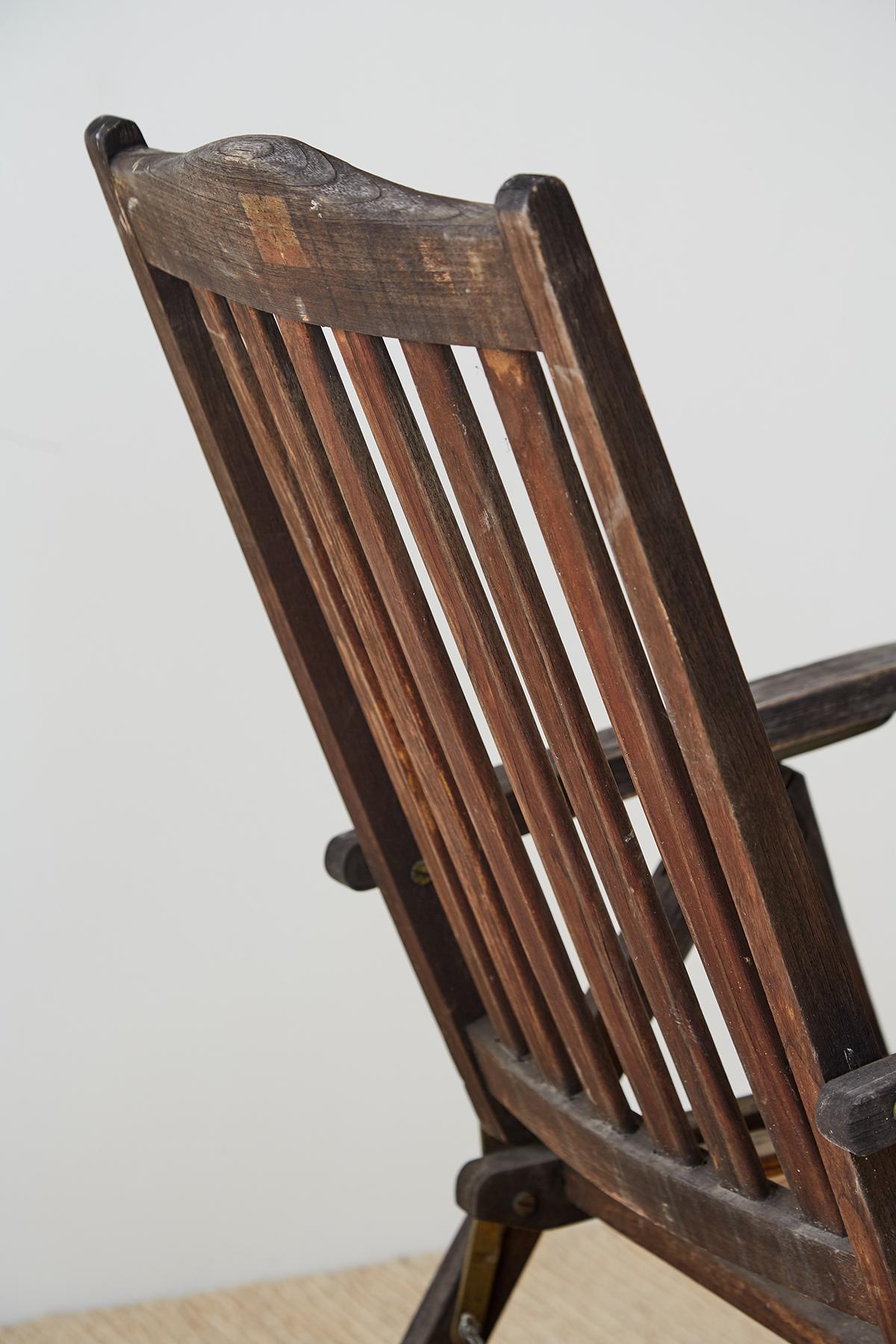 Brass Pair of Weathered Vintage Teak Folding Chairs