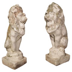 Pair of Weathered White Cement Seated Lions from England, circa 1960