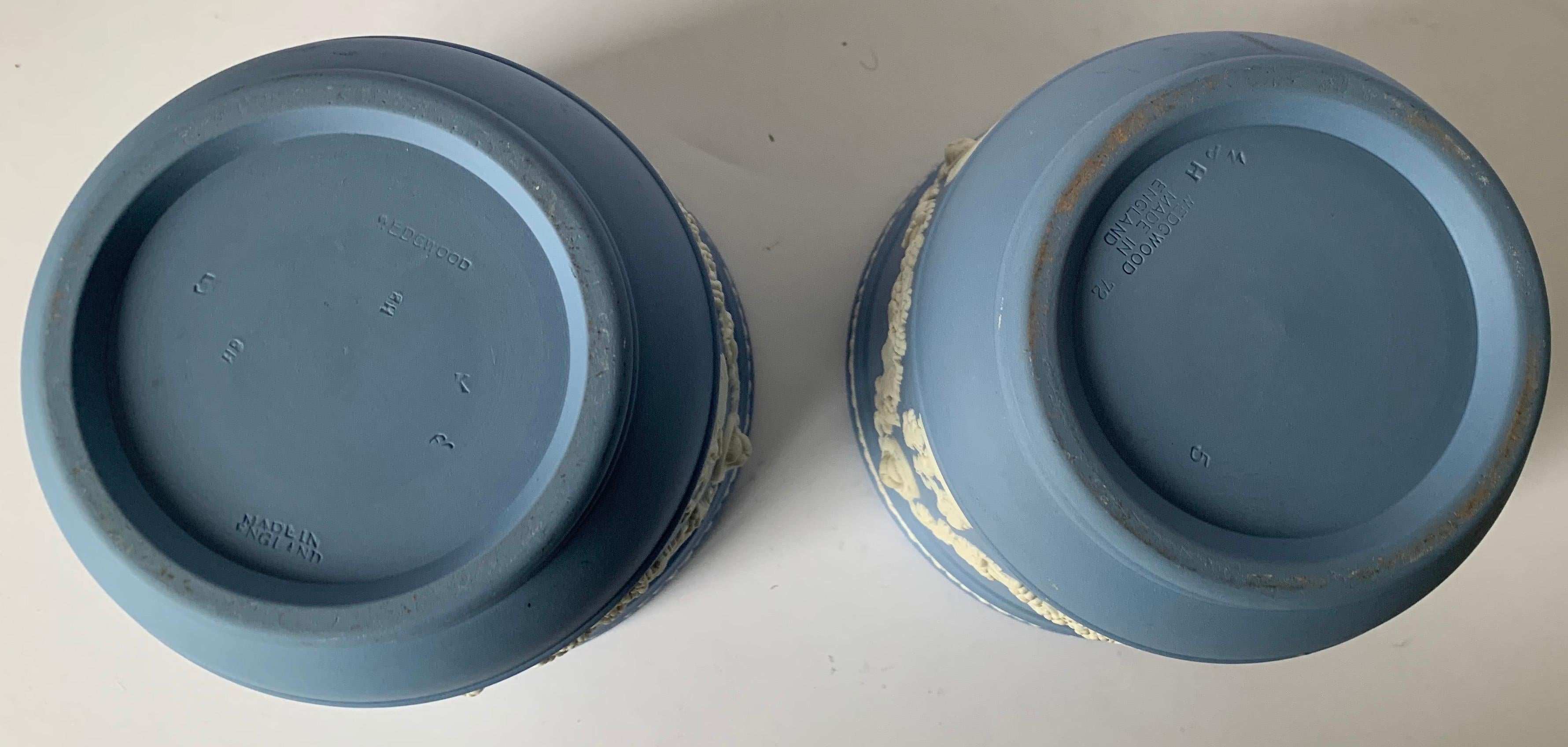 Pair of Wedgwood small light blue cache pot/ flower pot. Overall neoclassical motif. Stamped on the underside.