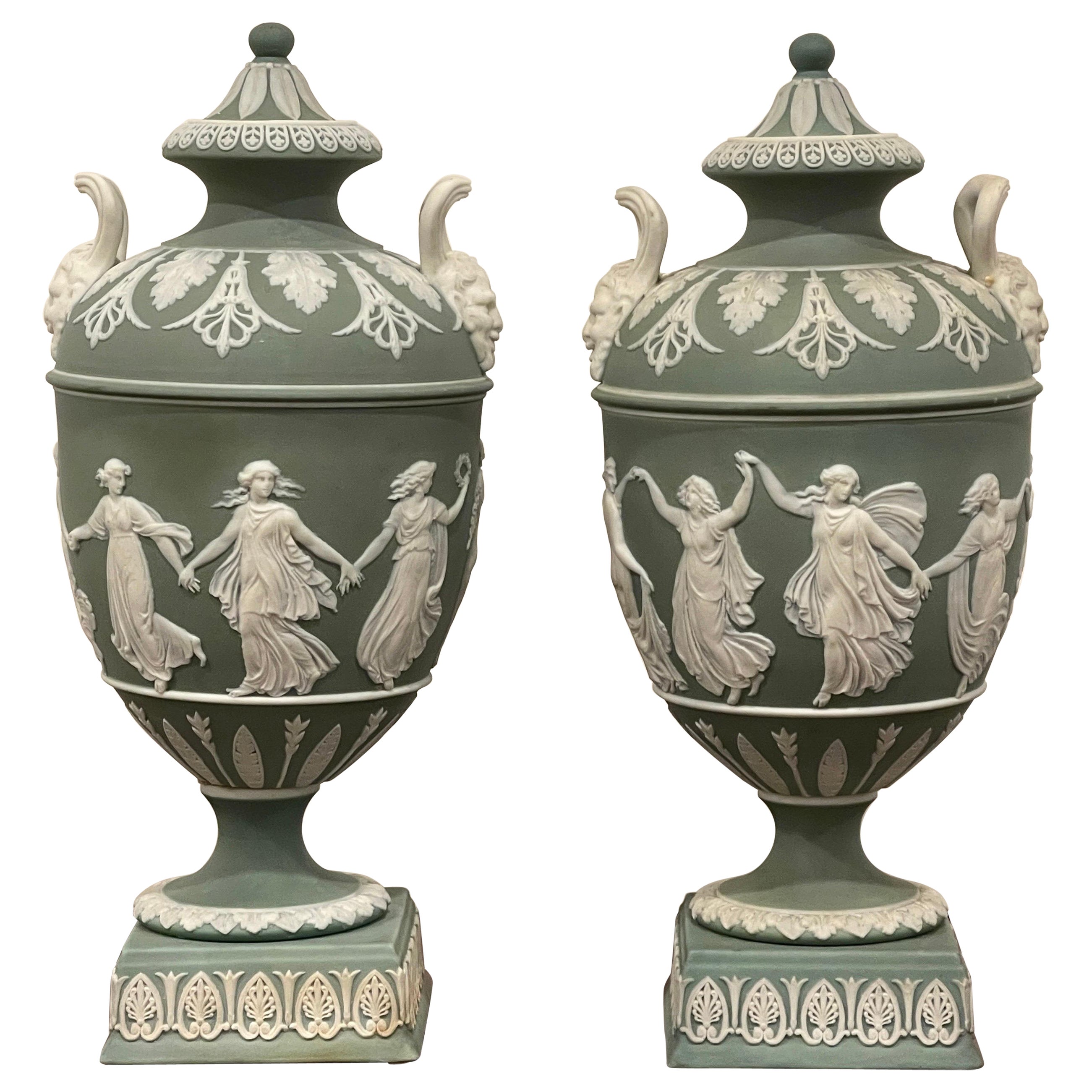 Pair of Wedgwood Olive Basalt ‘Dancing Hours ‘ Vases with Covers
