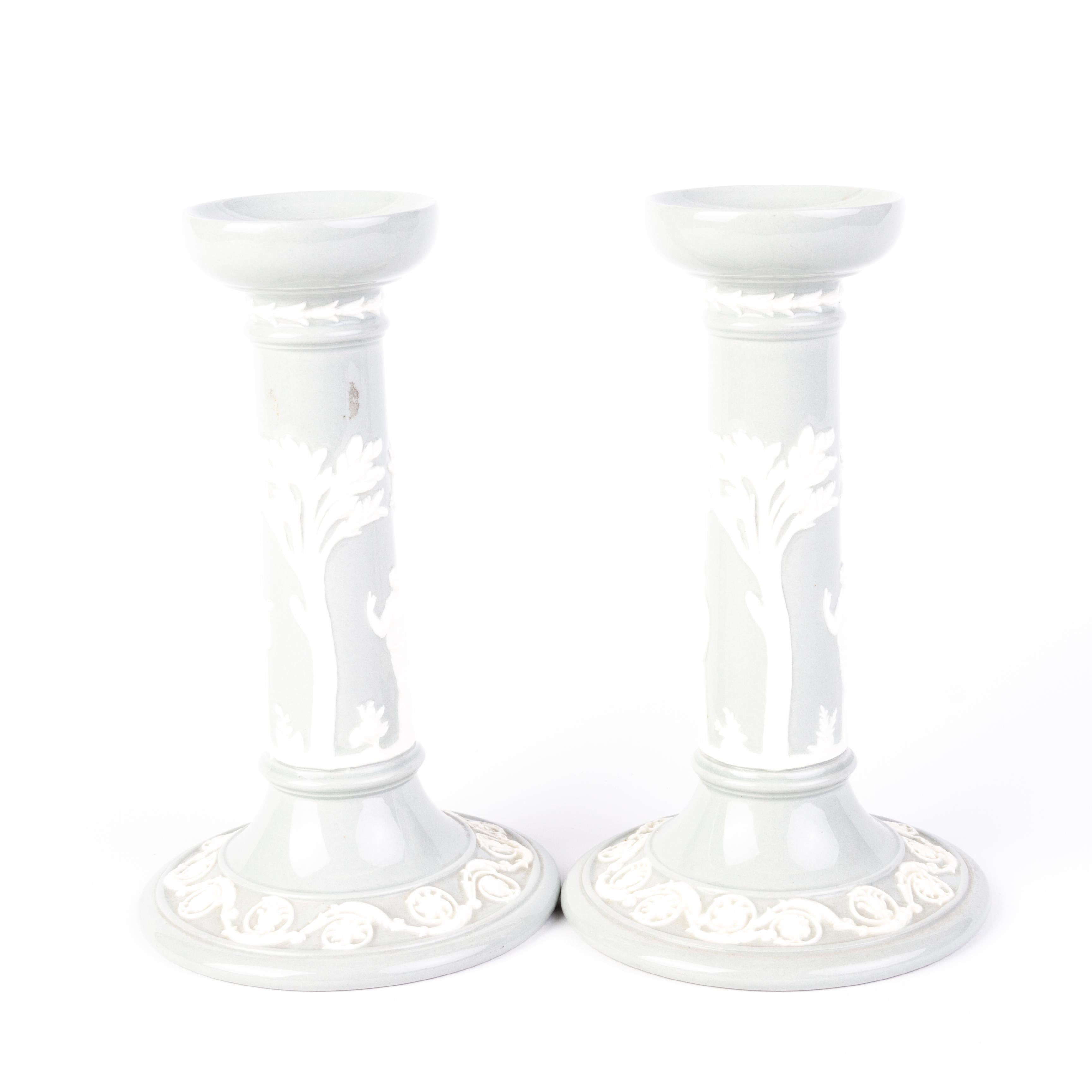 Pair of Wedgwood Queens Ware Neoclassical Cameo Candlesticks 
Good condition 
From a private collection.
Free international shipping.