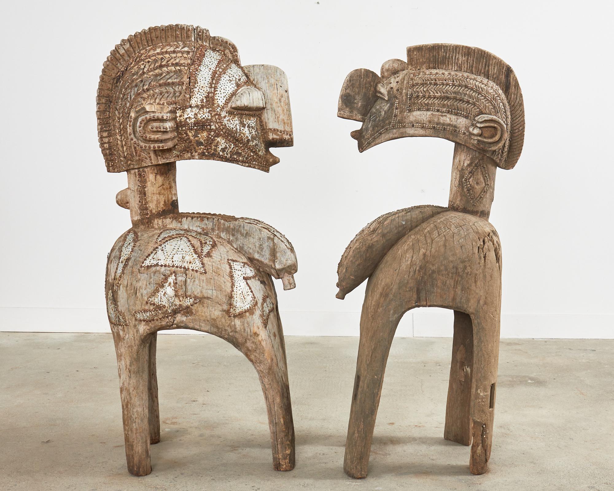 Paar westafrikanische Baga Nimba-Skulpturen mit geschnitzter Fruchtbarkeitsmaske (Stammeskunst) im Angebot