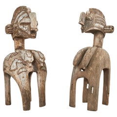 Pareja de esculturas de máscaras de fertilidad talladas Baga Nimba de África Occidental
