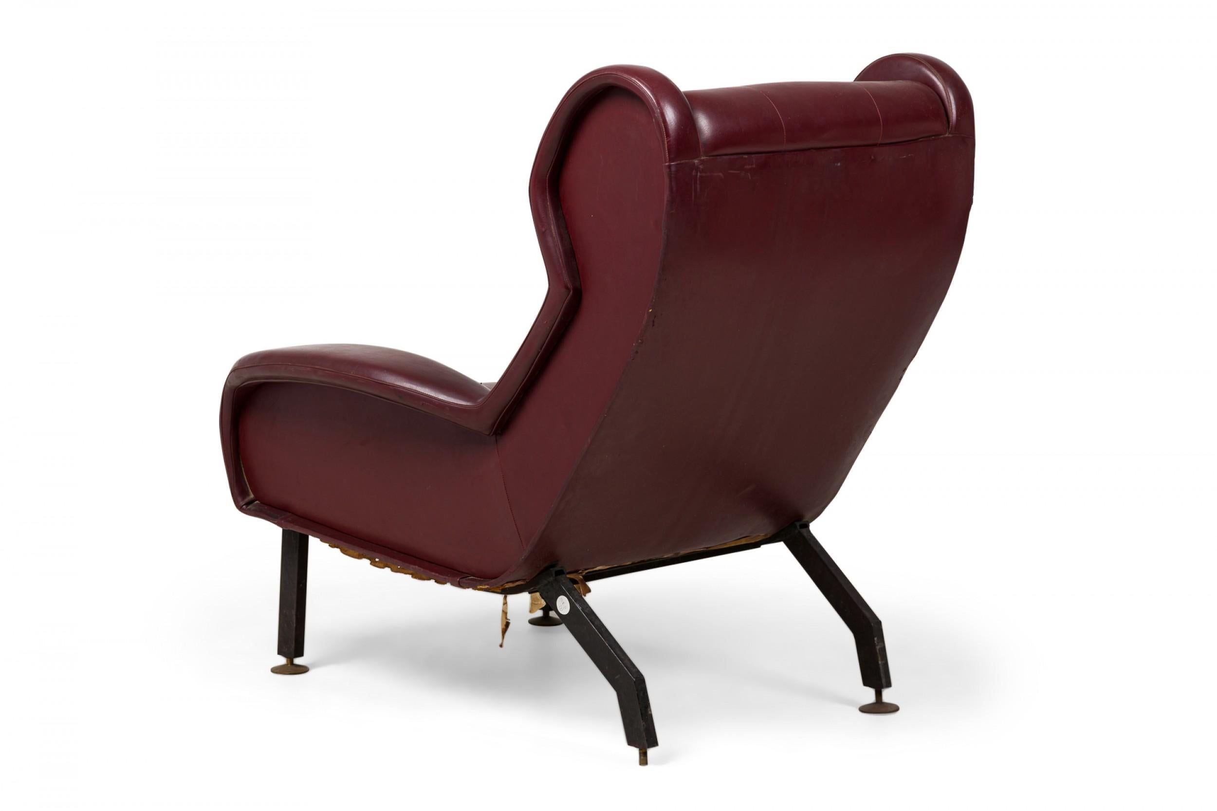 Pair of Westnofa Norwegian Burgundy Leather Upholstered Wing Armchairs In Good Condition For Sale In Queens, NY