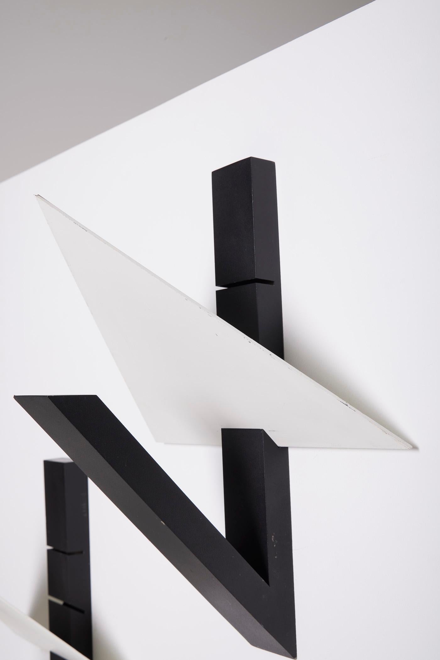 Pair of white and black wall sconces by Lucien Gau For Sale 10