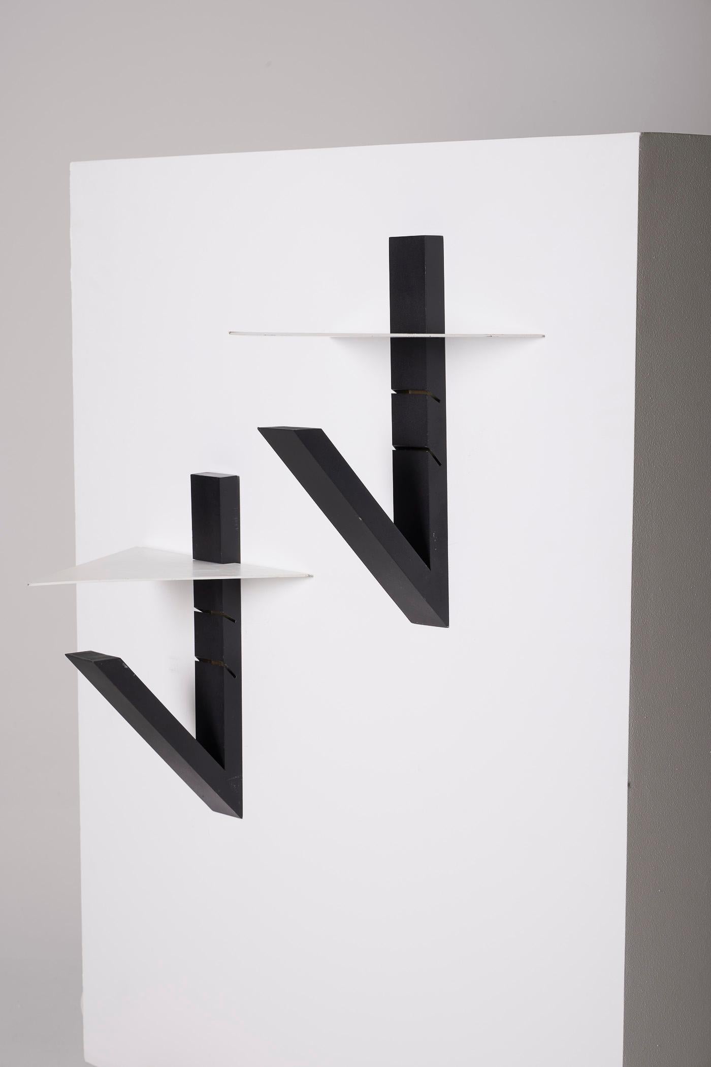 20th Century Pair of white and black wall sconces by Lucien Gau For Sale