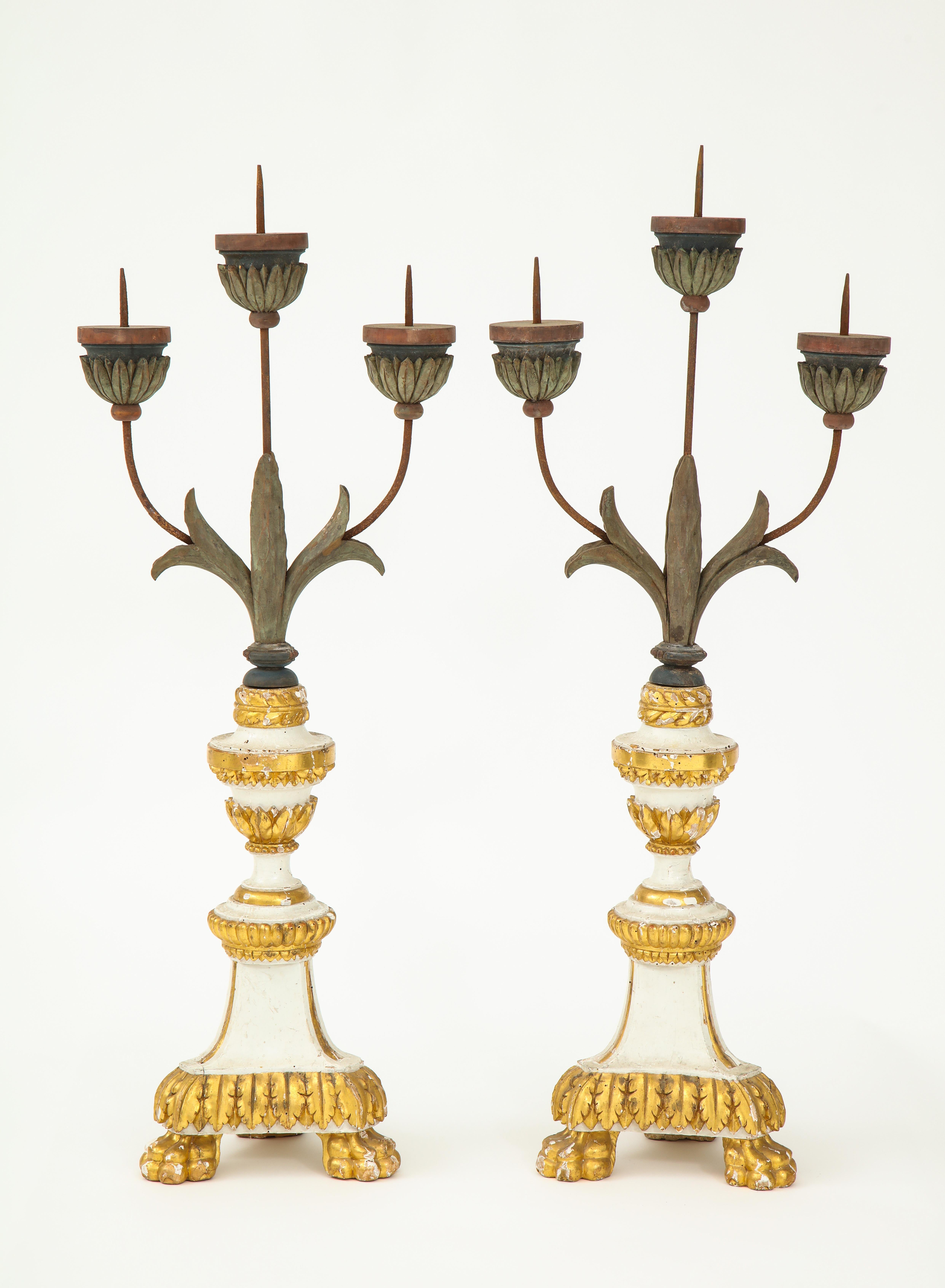Fantastic and tall three armed hand carved candlesticks.