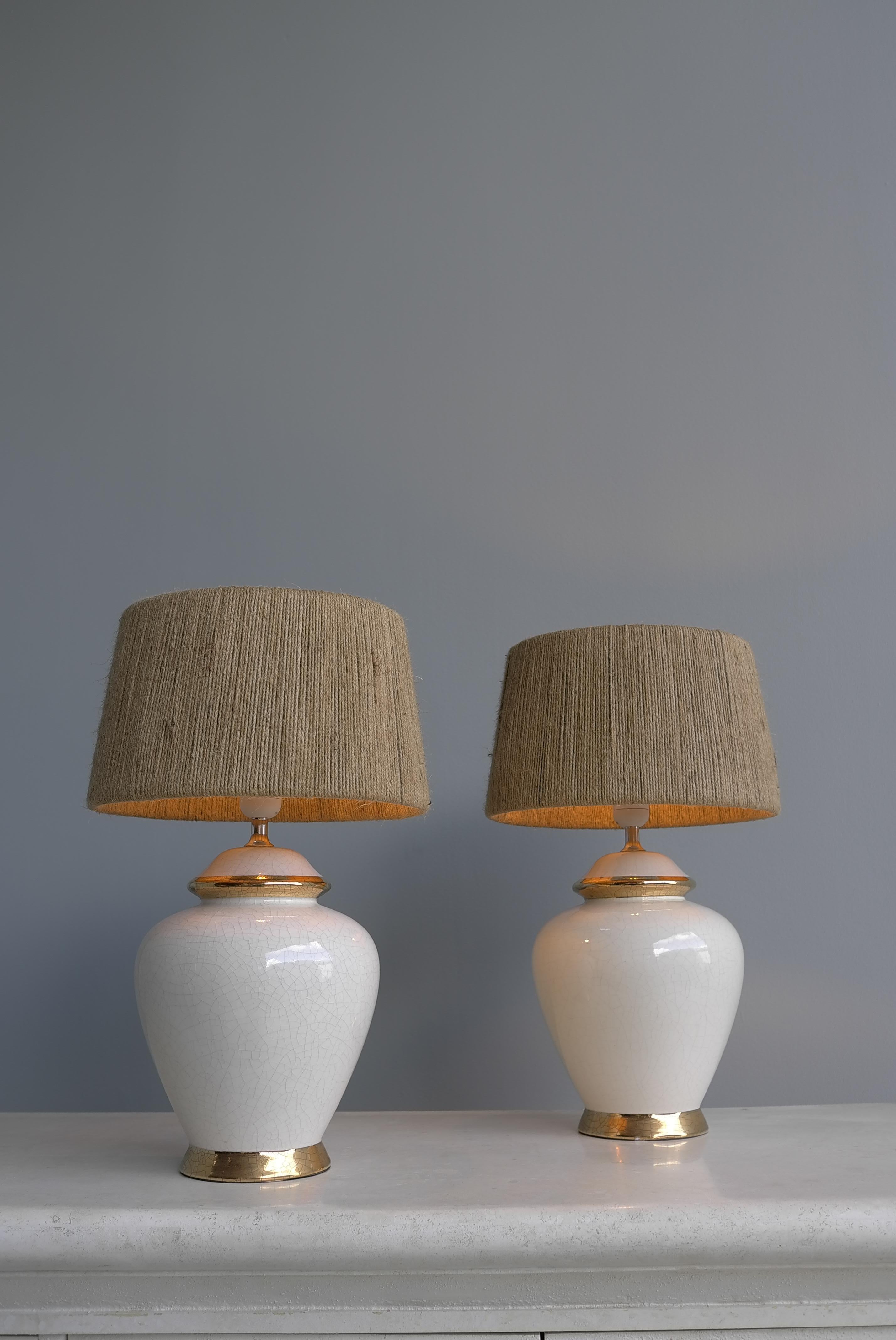 Pair of White and Gold Craquelure Glaze Ceramic French Lamps with rope shades France circa 1975
