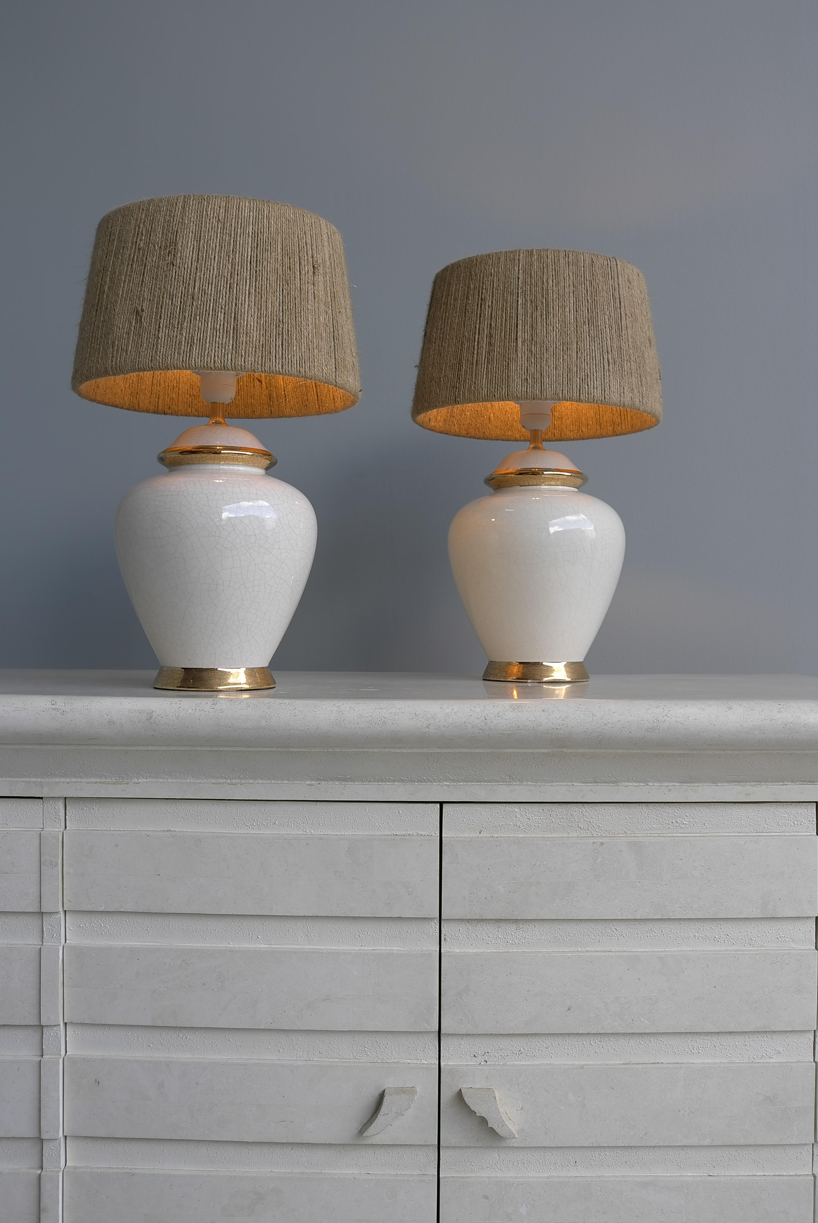 Mid-Century Modern Pair of White and Gold Craquelure Glaze Ceramic French Lamps with Rope Shades  For Sale