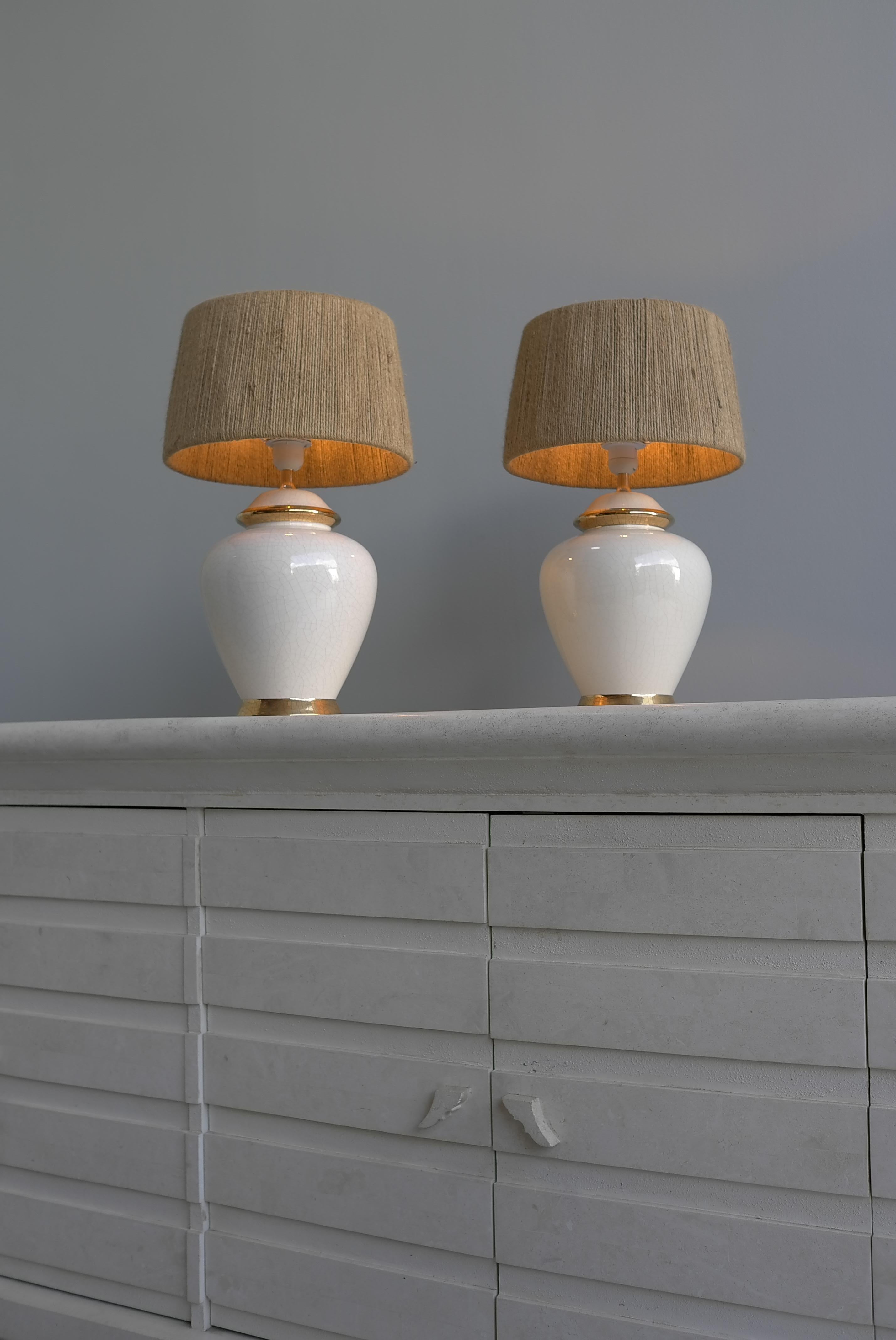 Late 20th Century Pair of White and Gold Craquelure Glaze Ceramic French Lamps with Rope Shades  For Sale