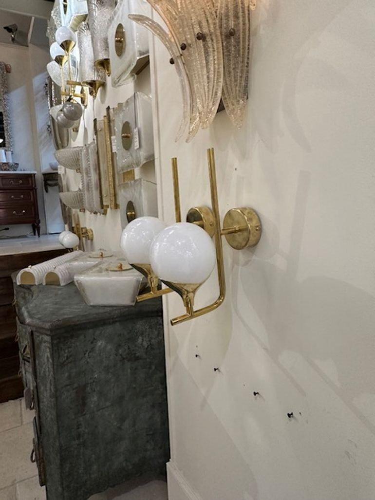 Pair of White Ball Form Murano Glass Sconces on Brass Base In Good Condition For Sale In Dallas, TX