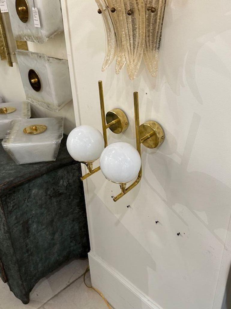 Contemporary Pair of White Ball Form Murano Glass Sconces on Brass Base For Sale