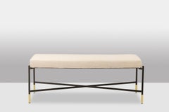 Pair of white benches, in lacquered and gold metal. 2000s.