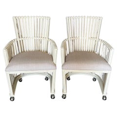 Pair of White Bent Rattan Side or Club Chairs on Casters