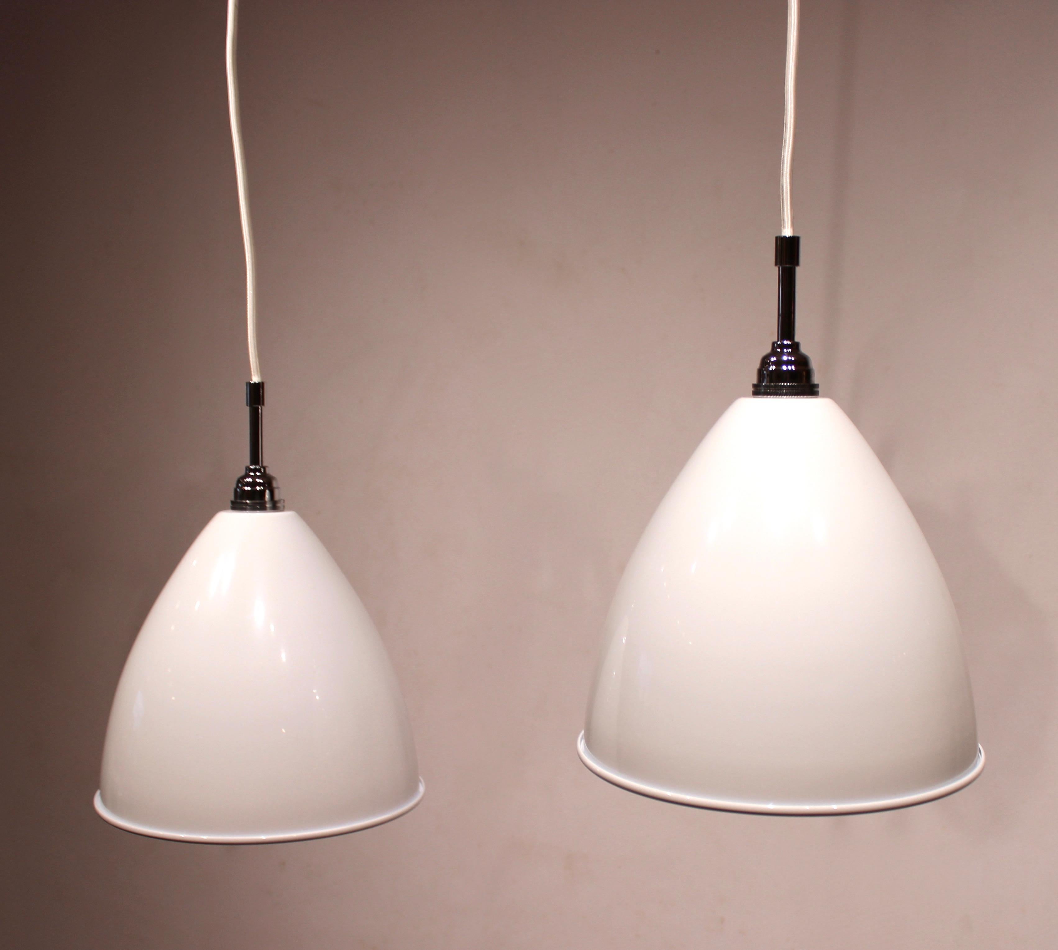 A pair of white bestlite pendants, model BL9, by Robert Dudley Best for Gubi. The pendants are in great vintage condition.