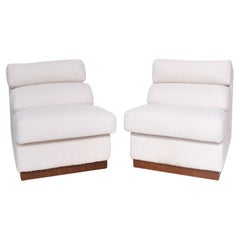 Pair of white bouclé chairs, 1970s.
