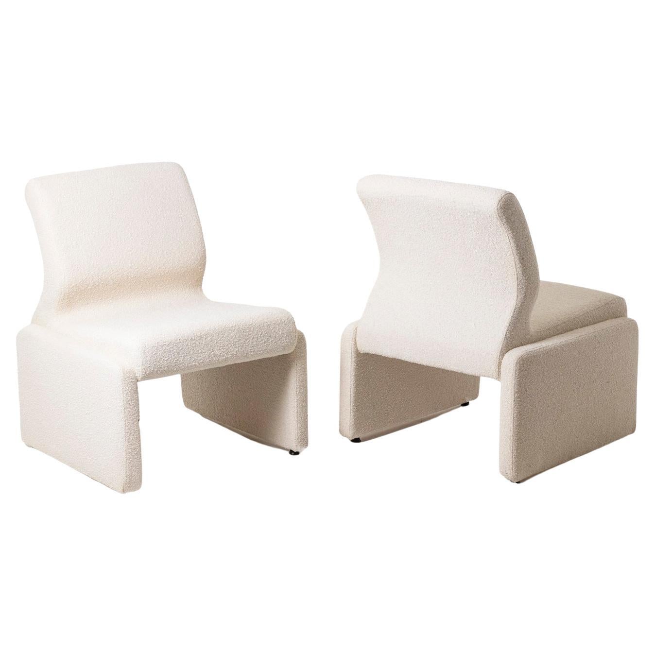Pair of white bouclé low chairs, 1970s