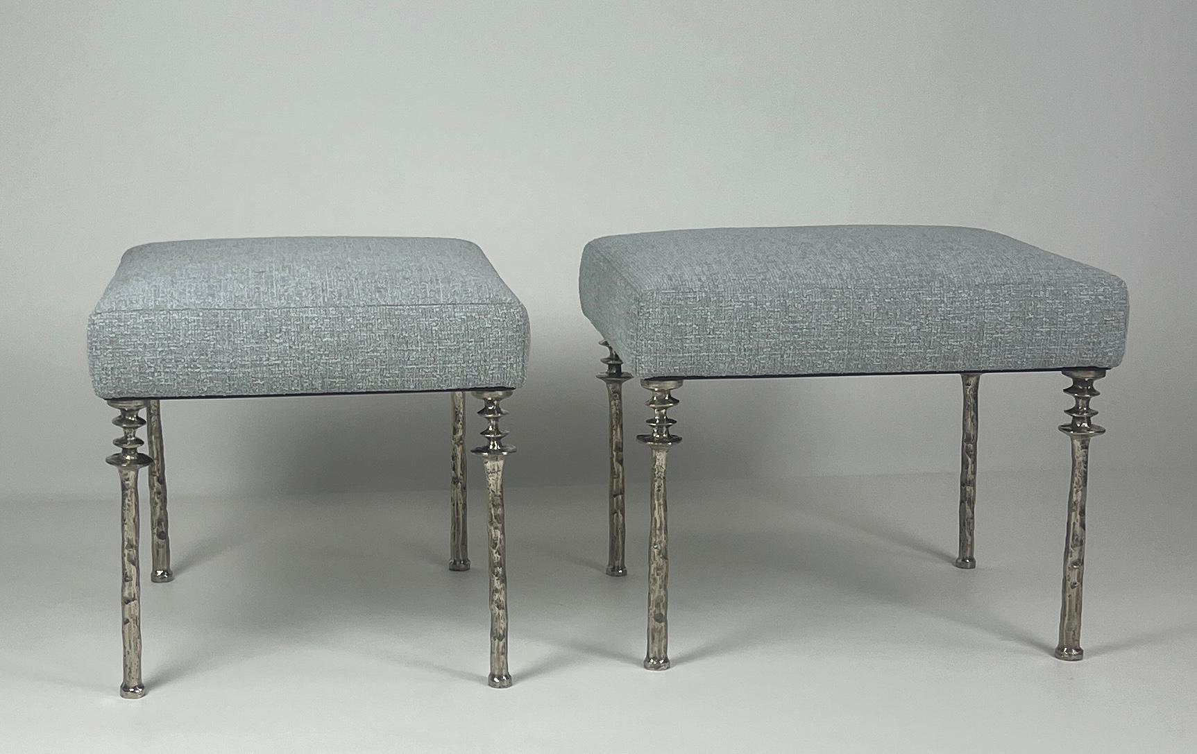Two beautiful stools inspired by Diego Giacometti, these stools are ideal for those who are looking for unique seating. Their White cast bronze legs provide a truly organic touch. 