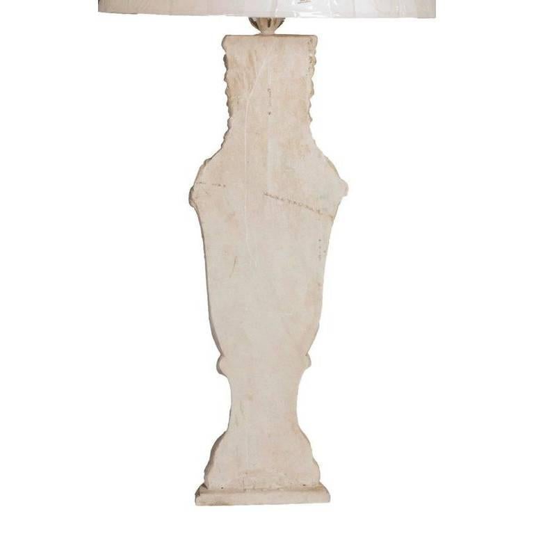 Pair of white Carrara marble of caryatid with claw-feet table lamps. Base made of early 19th century white Carrara marble architectural elements. Wired for US.